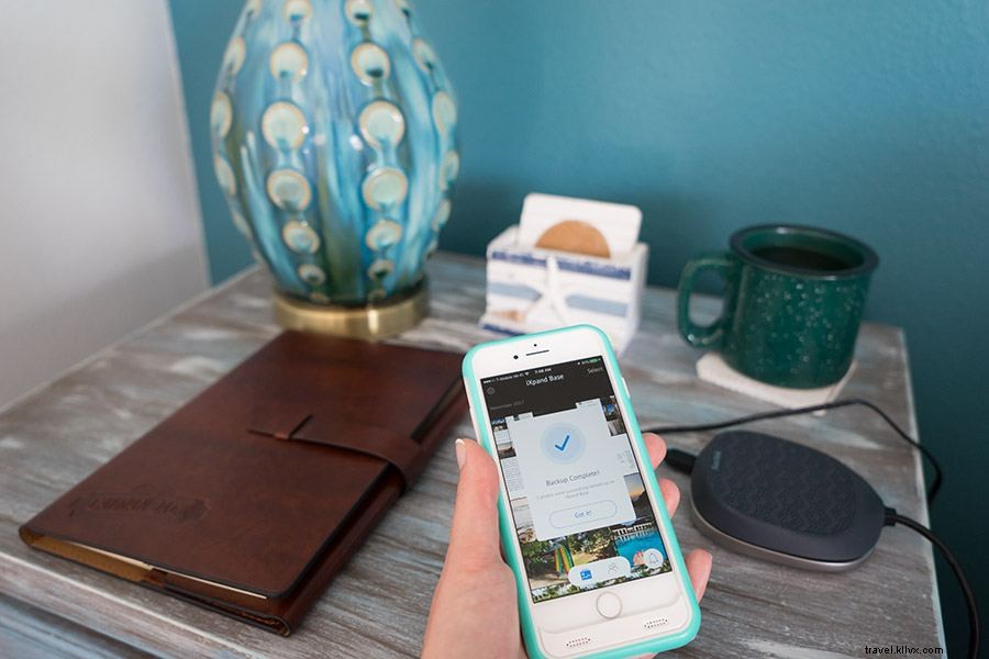 Automatic iPhone Backup for Travelers: Secure Photos with SanDisk iXpand Base