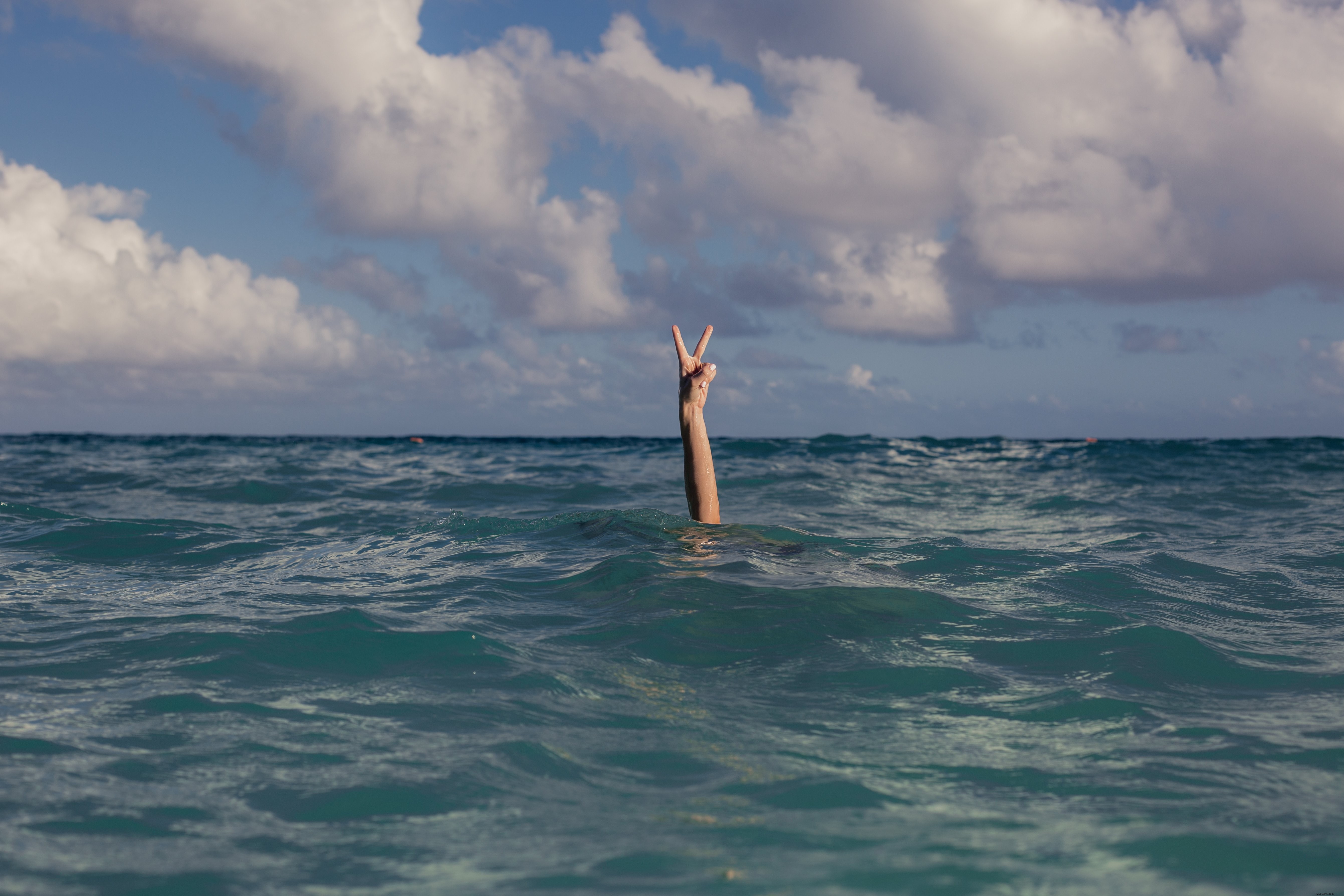 Serene Vacation Photo: Peace Sign in Crystal Clear Ocean