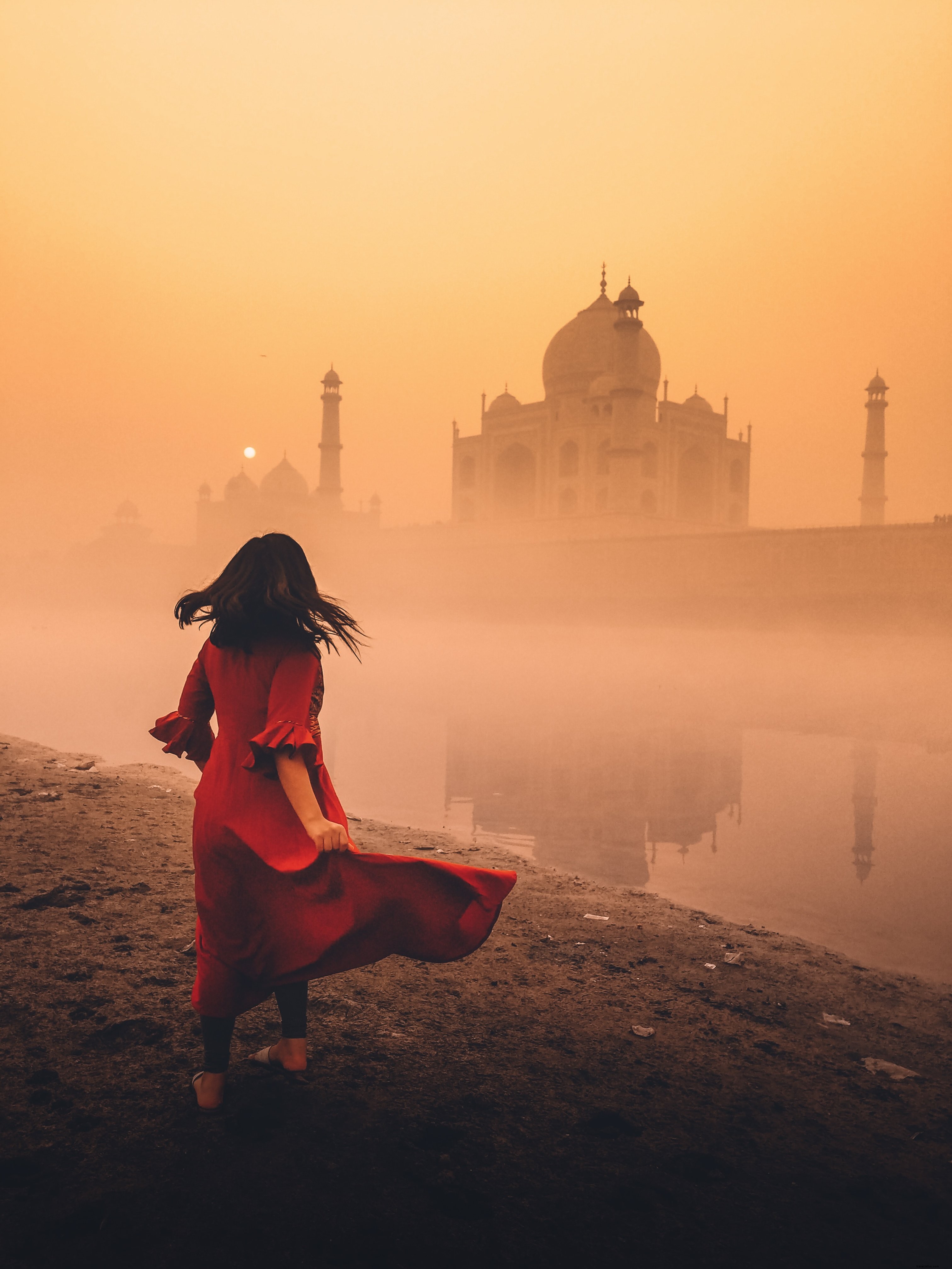 Stunning Photo: Temples Dancing in Ethereal Orange Mist