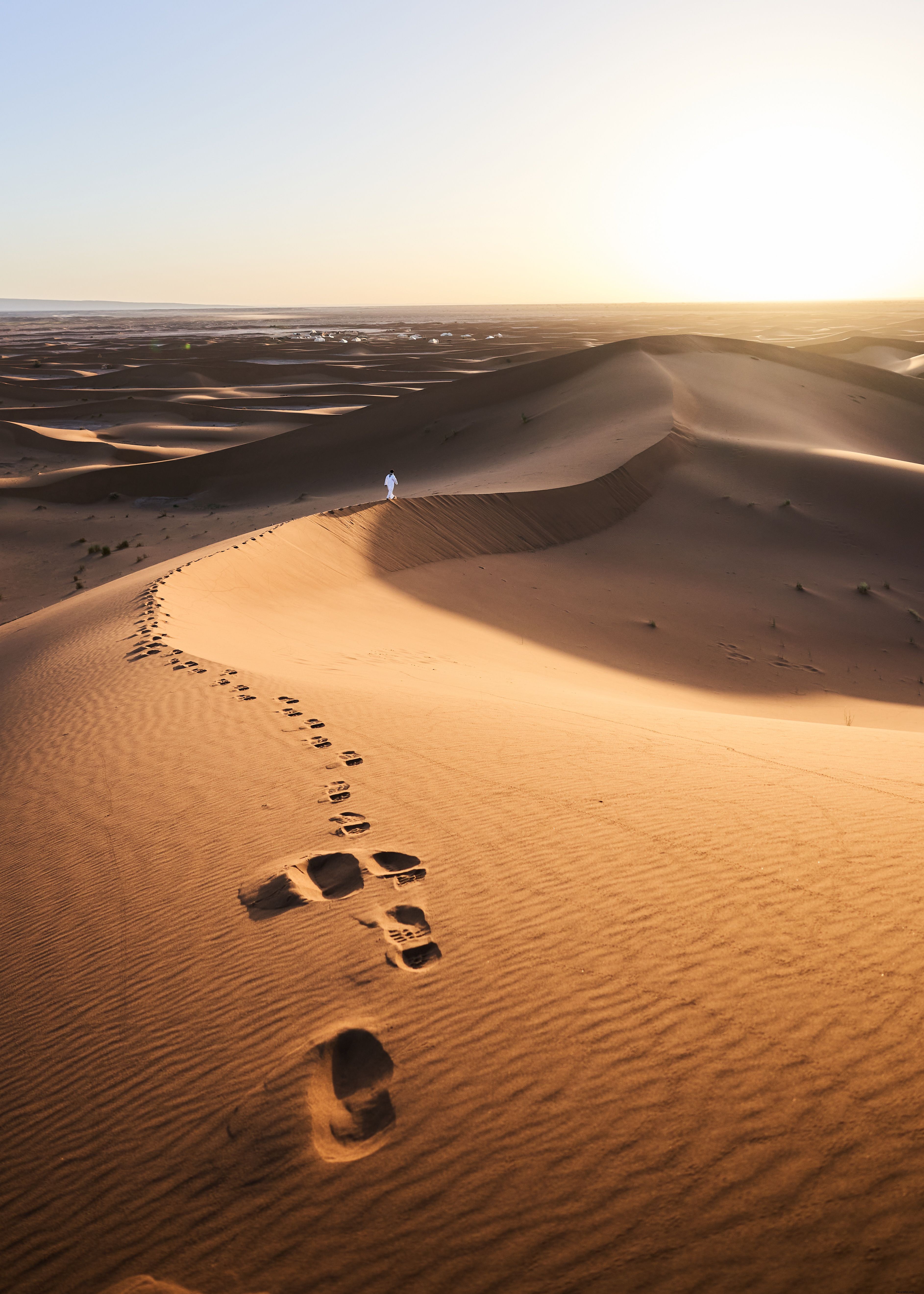 Stunning Footprints in Vast Sand Dunes – Captivating Desert Photography