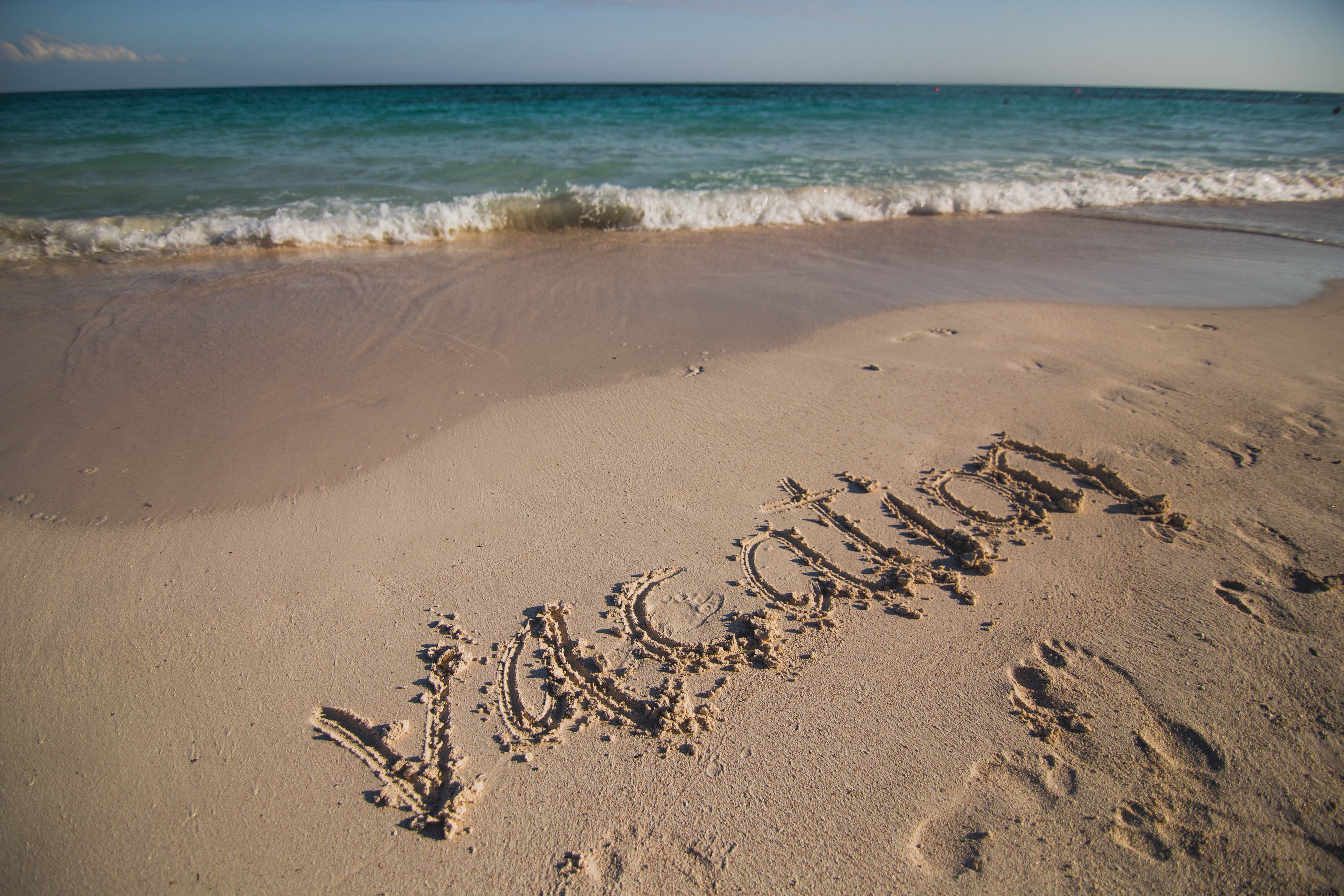 Stunning  Vacation  Written in Beach Sand Photo