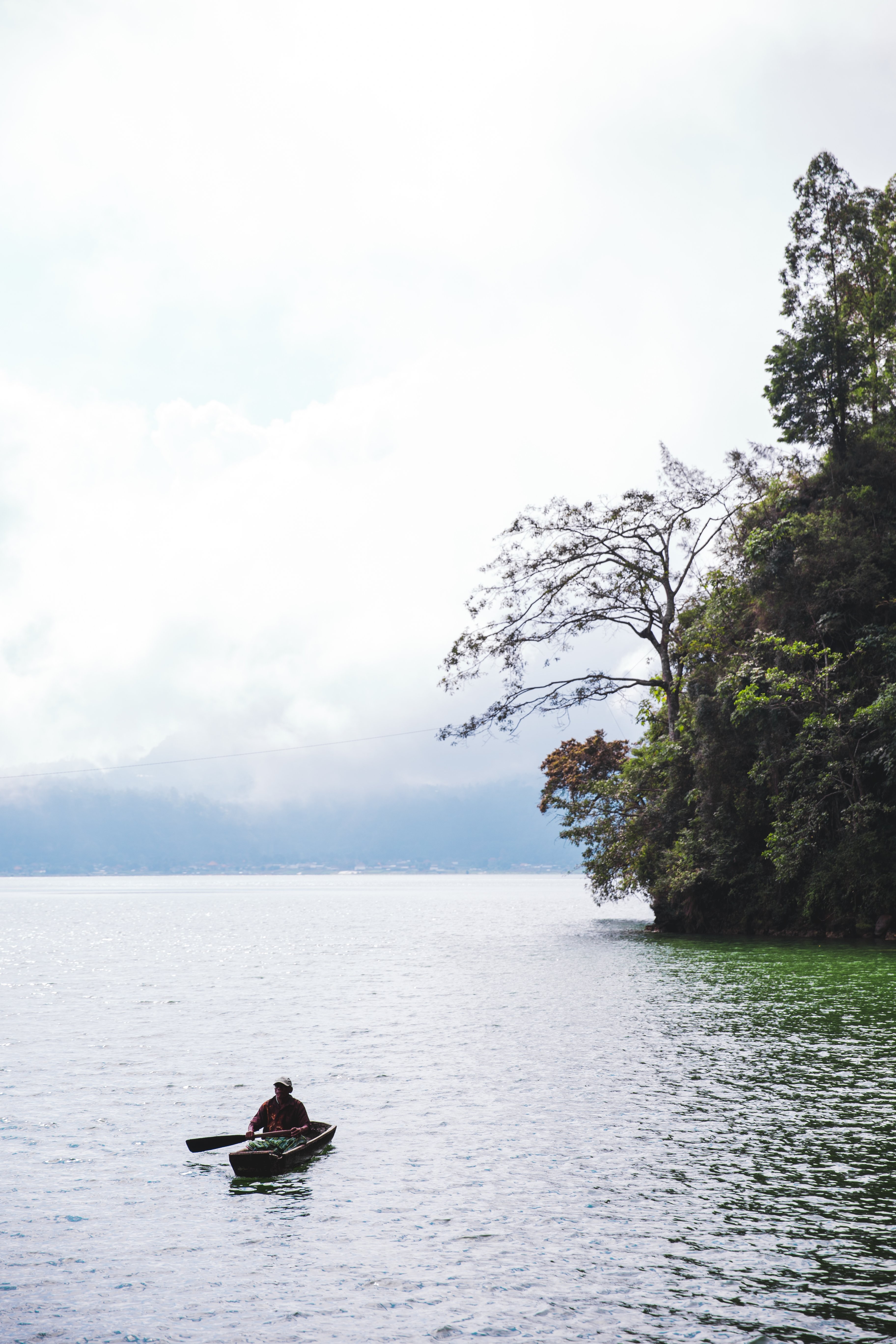 Stunning Cliffside Canoe: Breathtaking Nature Photography