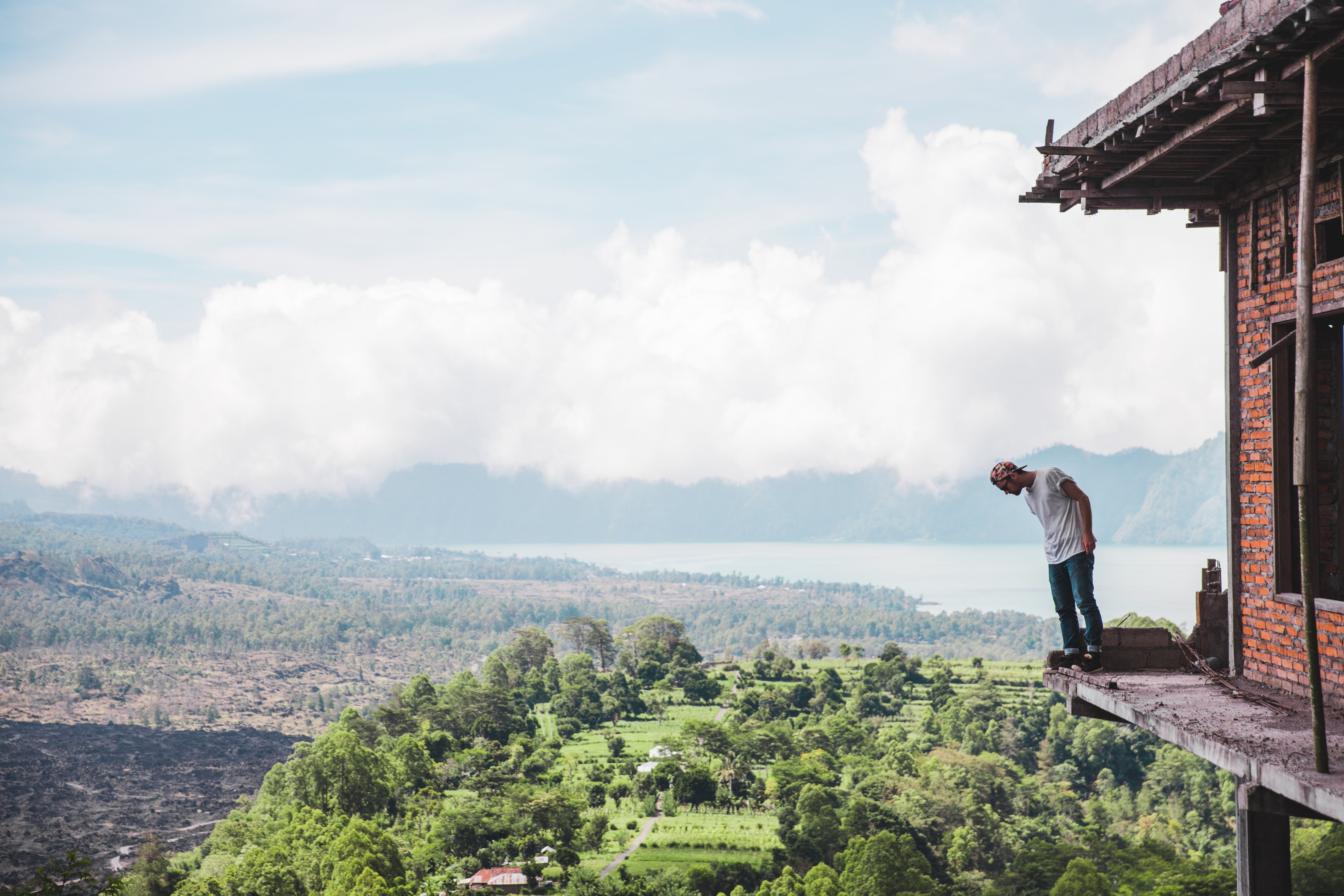 Captivating Photo: Traveler Gazing Downward