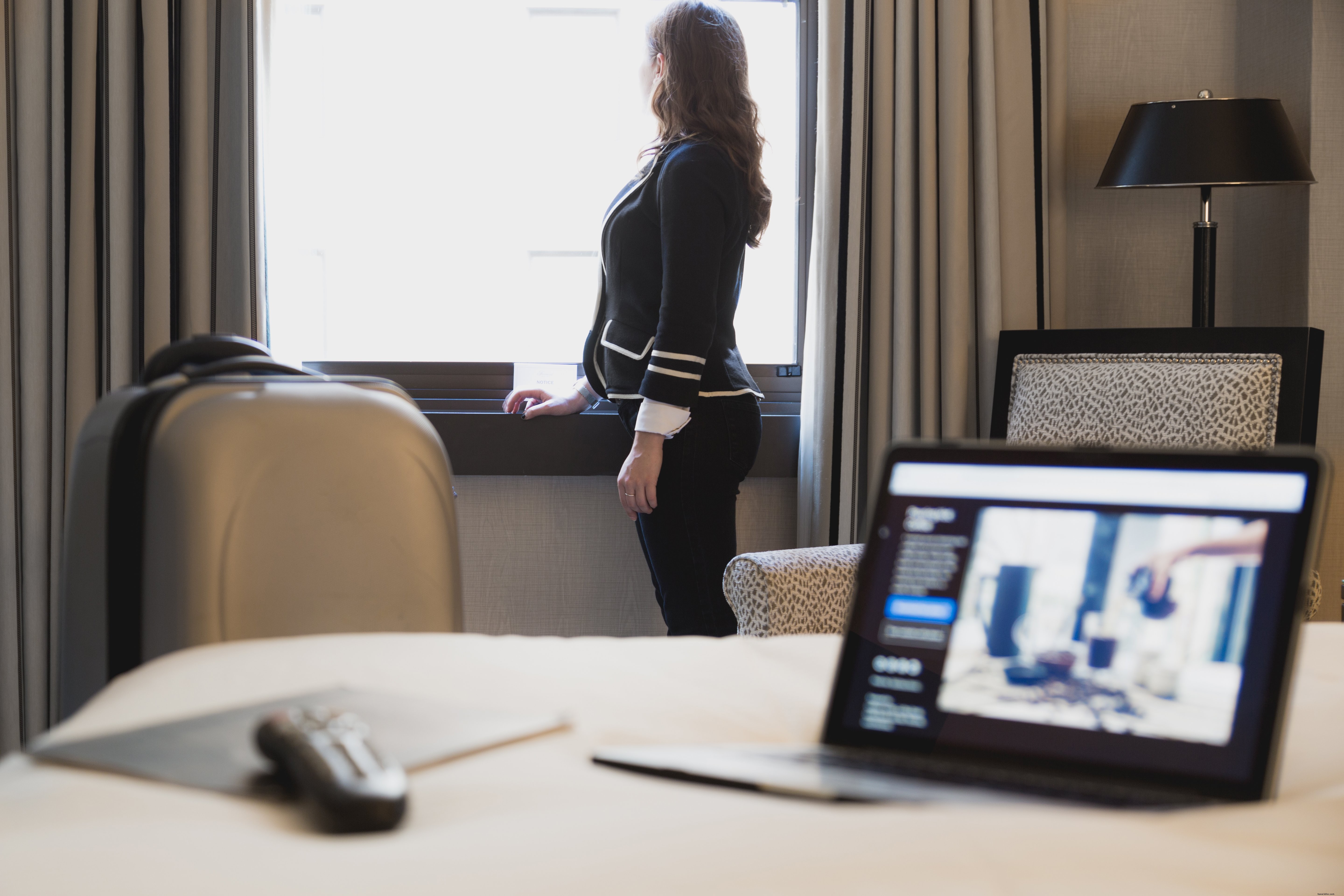 Elegant Businesswoman Settling into Hotel Room After Check-In | Stunning Professional Photo
