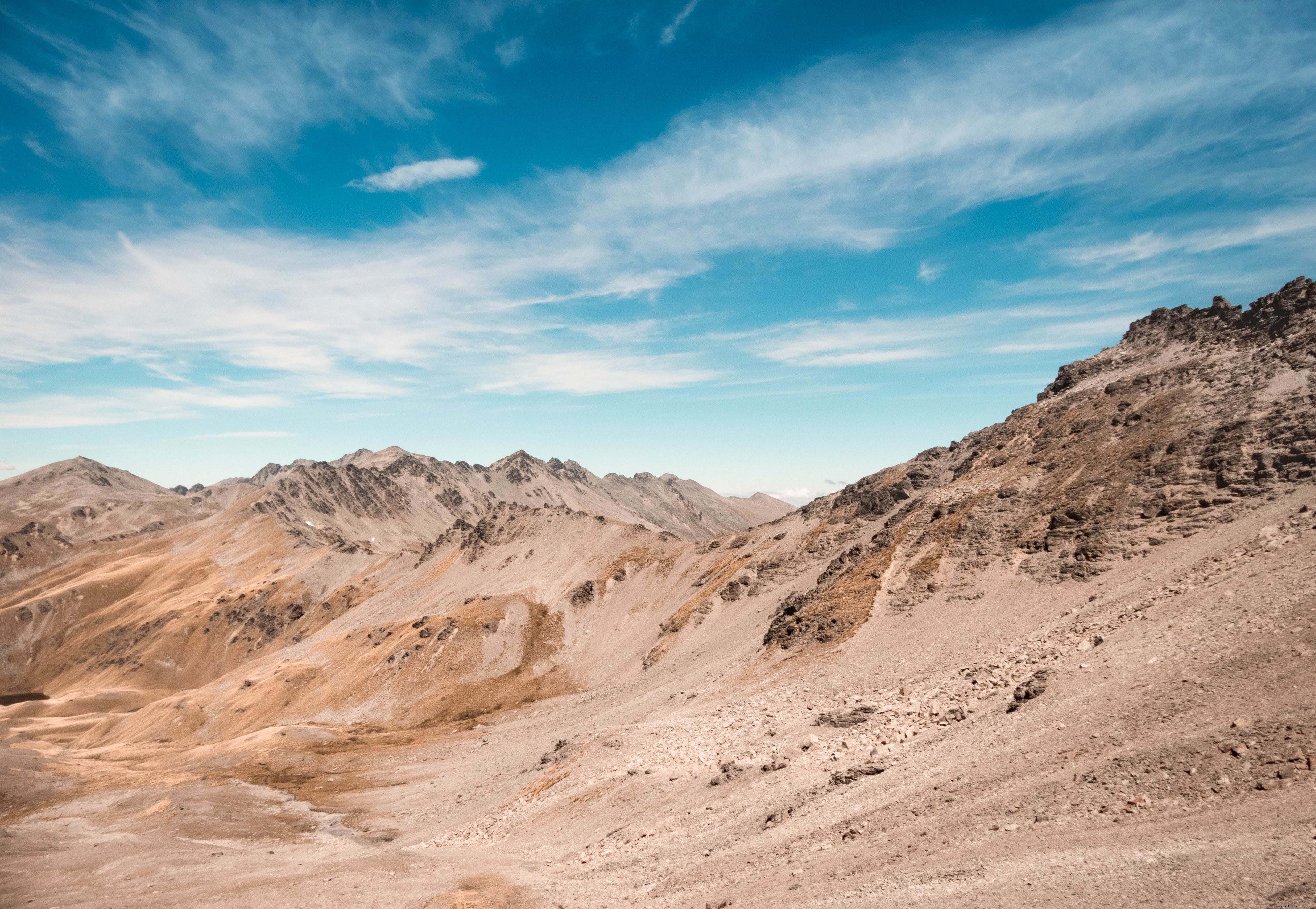 Stunning Red Sandy Hill Against Vibrant Blue Sky – Professional Landscape Photo