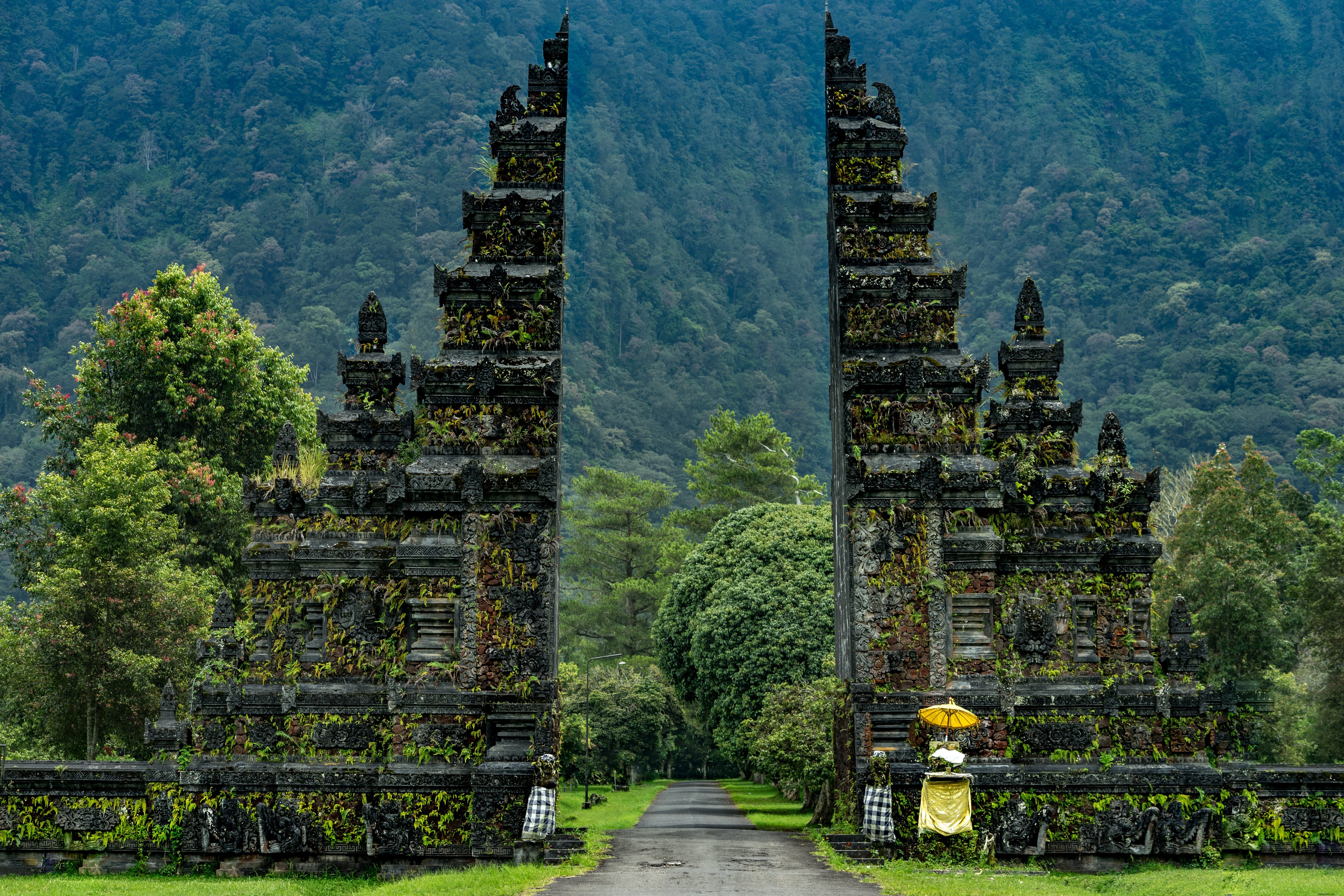 Majestic Temple Gateway Framed by Towering Mountains – Stunning Photo