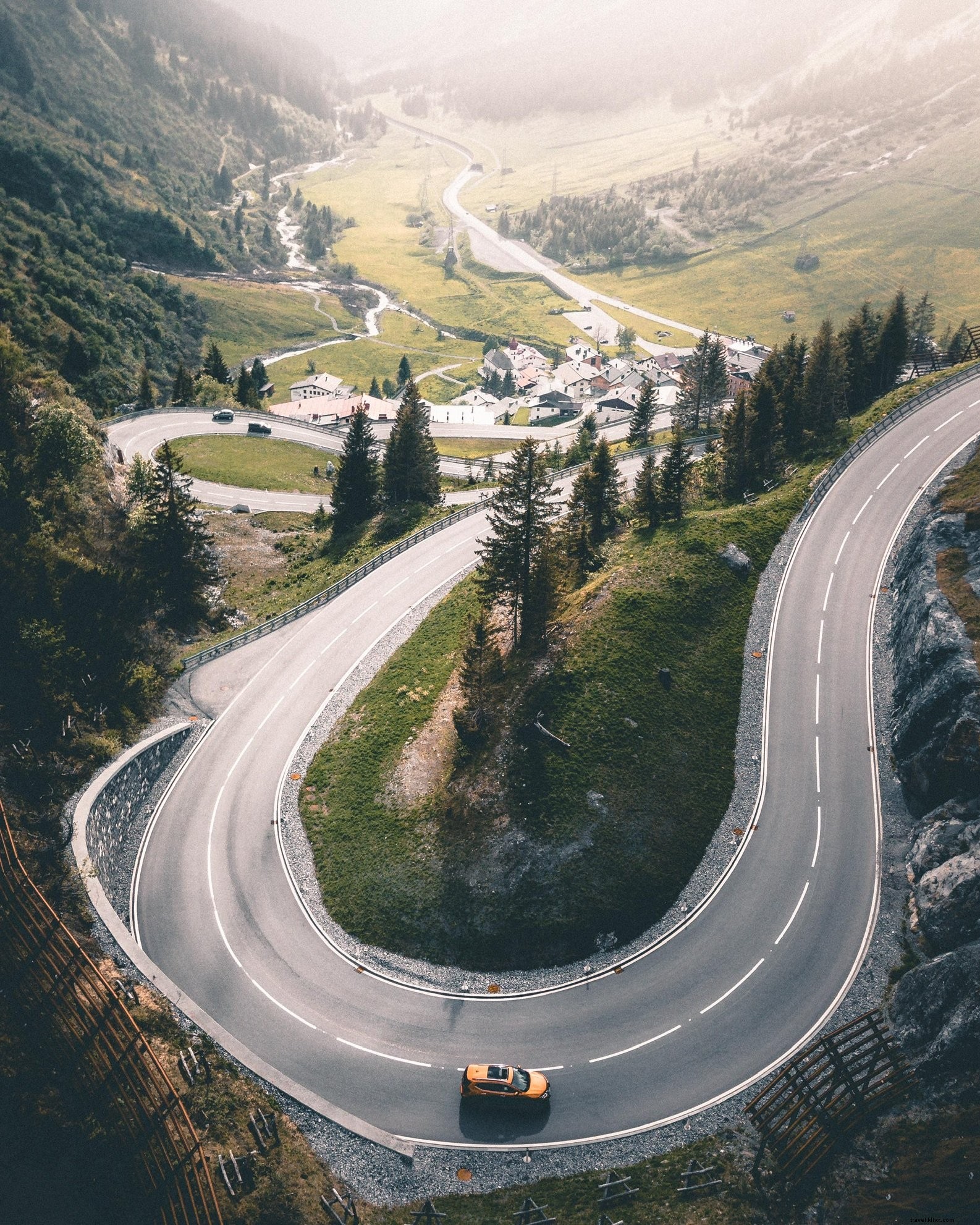 Stunning Winding Highway Climbing from Majestic Mountain Valley Photo