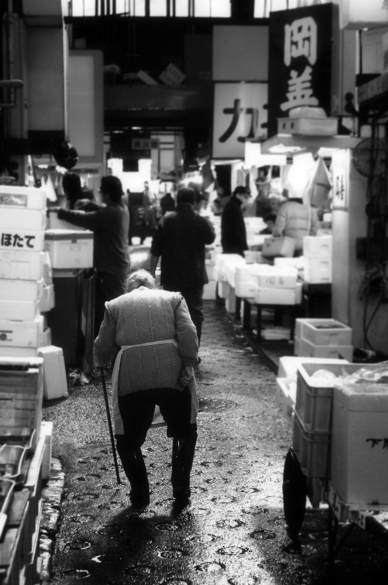 Authentic Photo: Elder Strolling Through Bustling Local Market