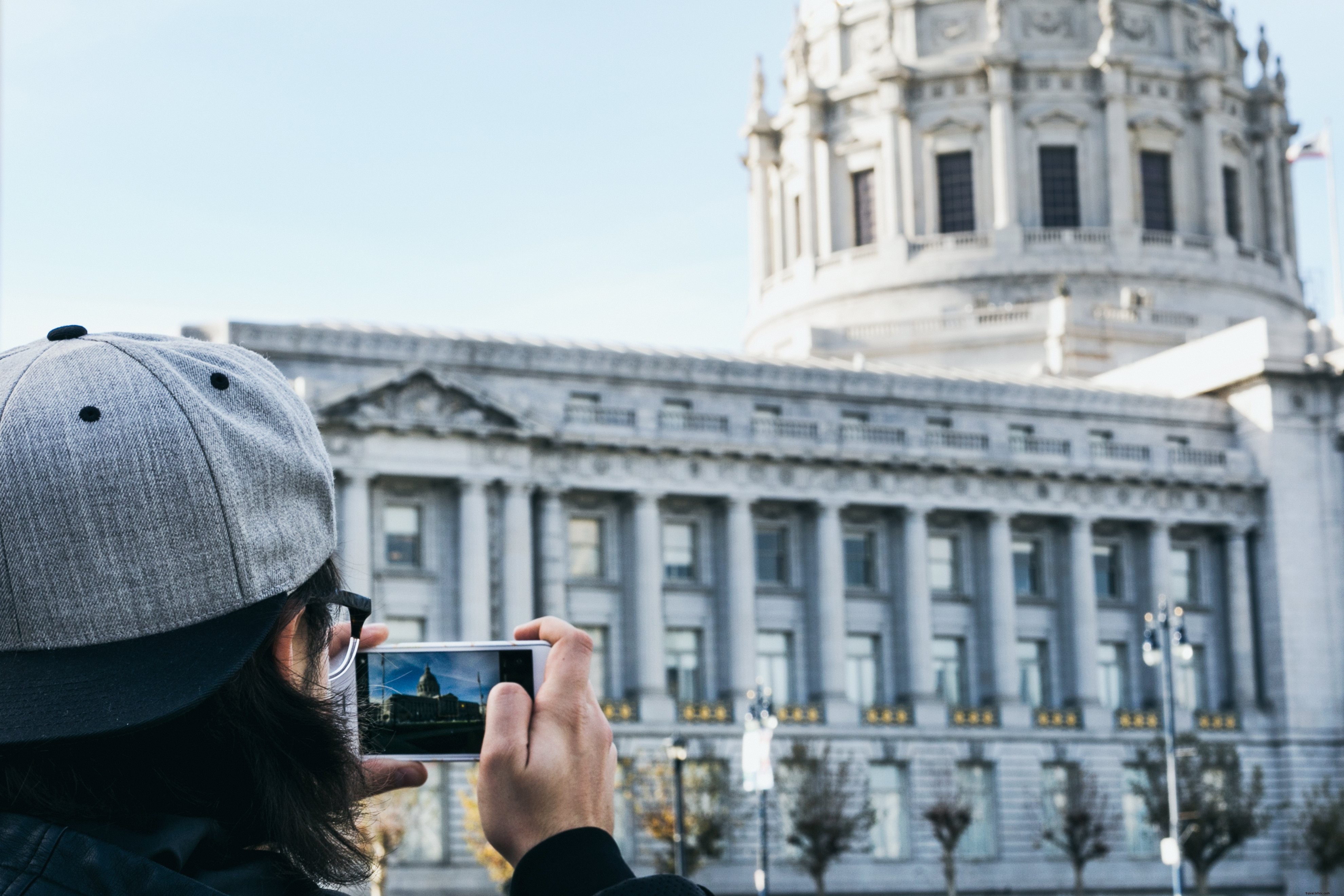 Captivating Image: Tourist Snapping Photo with Smartphone
