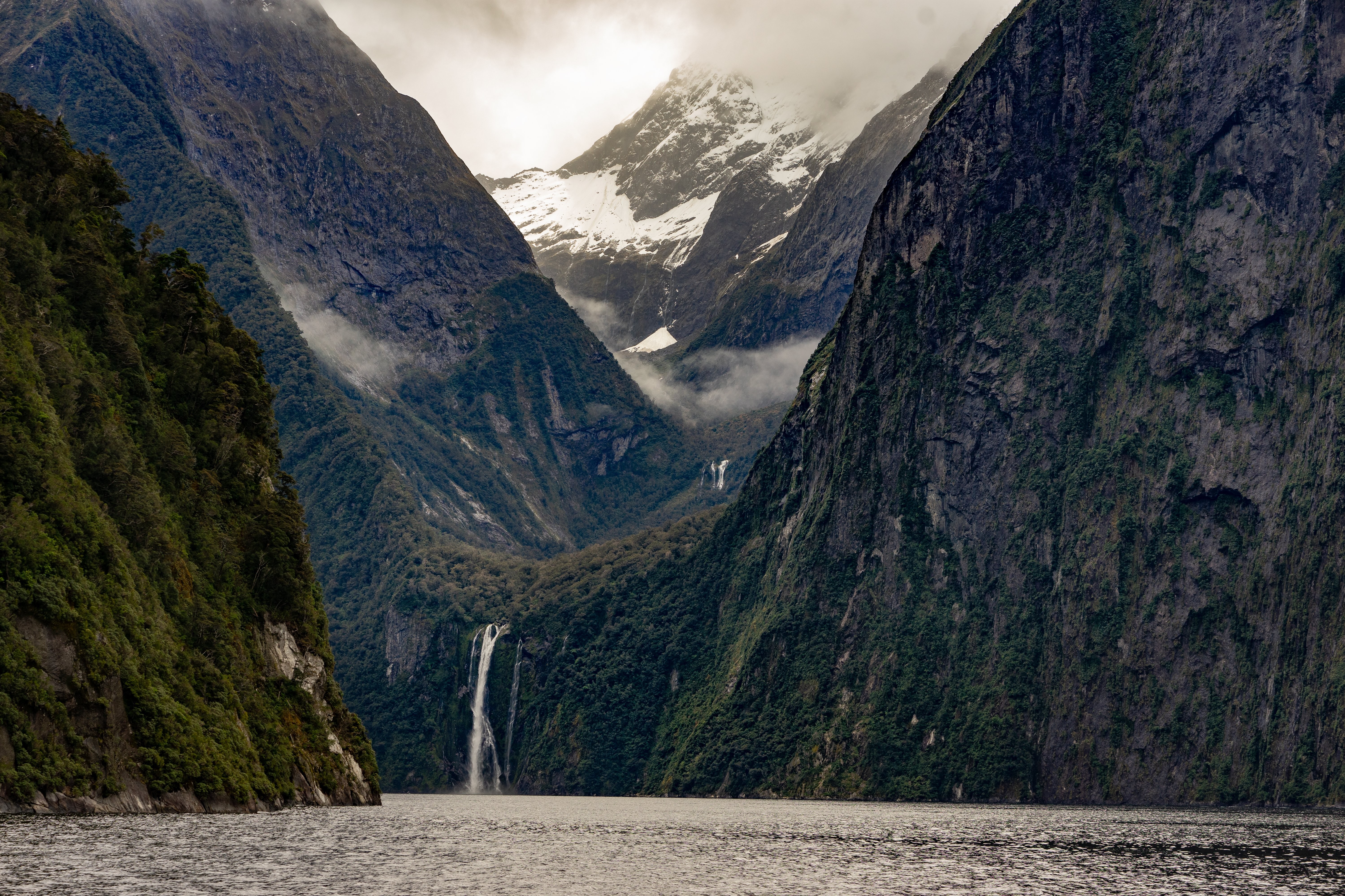Stunning Photo of Waterfall Cascading Through Mountain Side