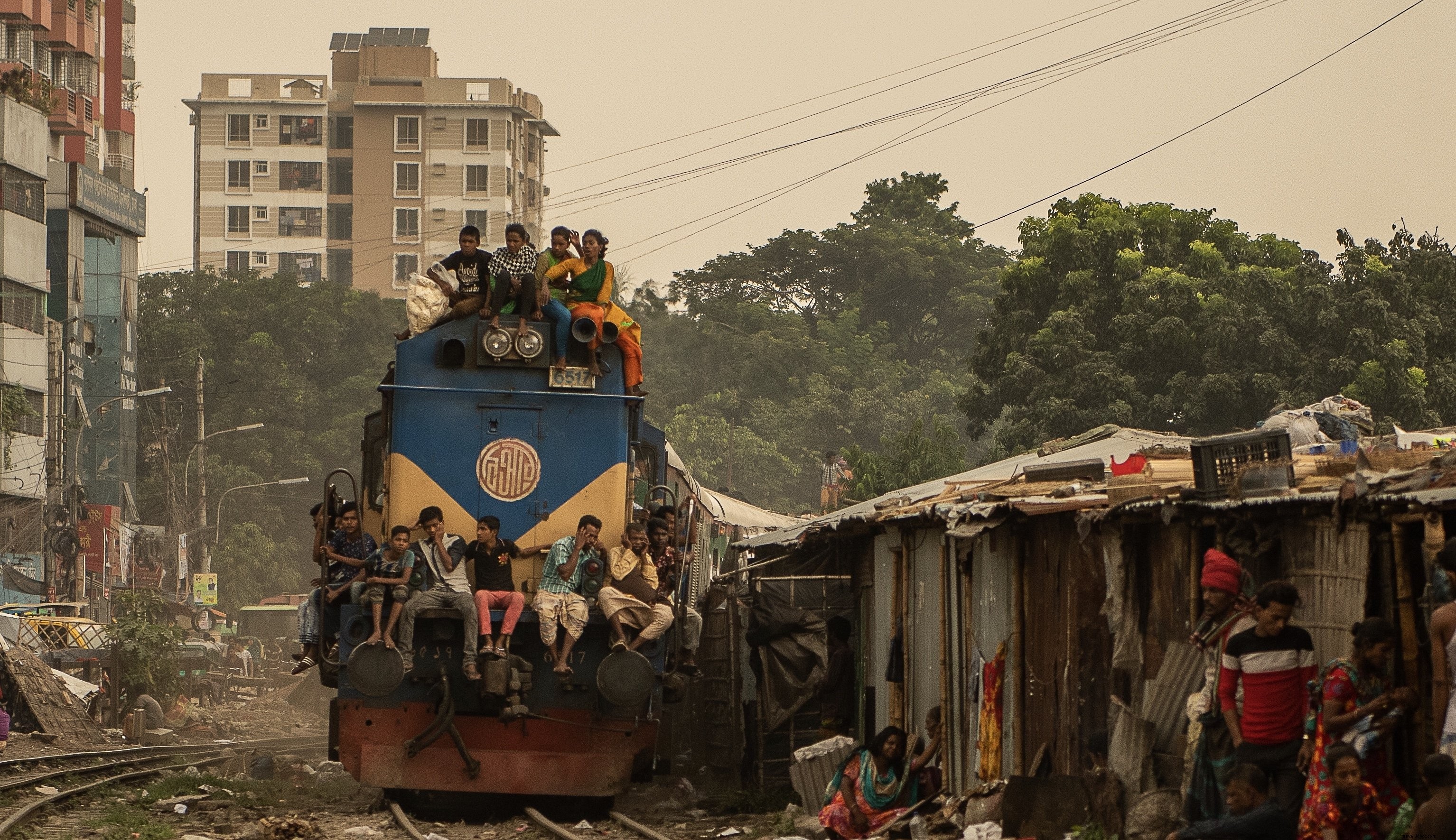 Captivating Photo: Commuters Spotting Seats on a Passing Train