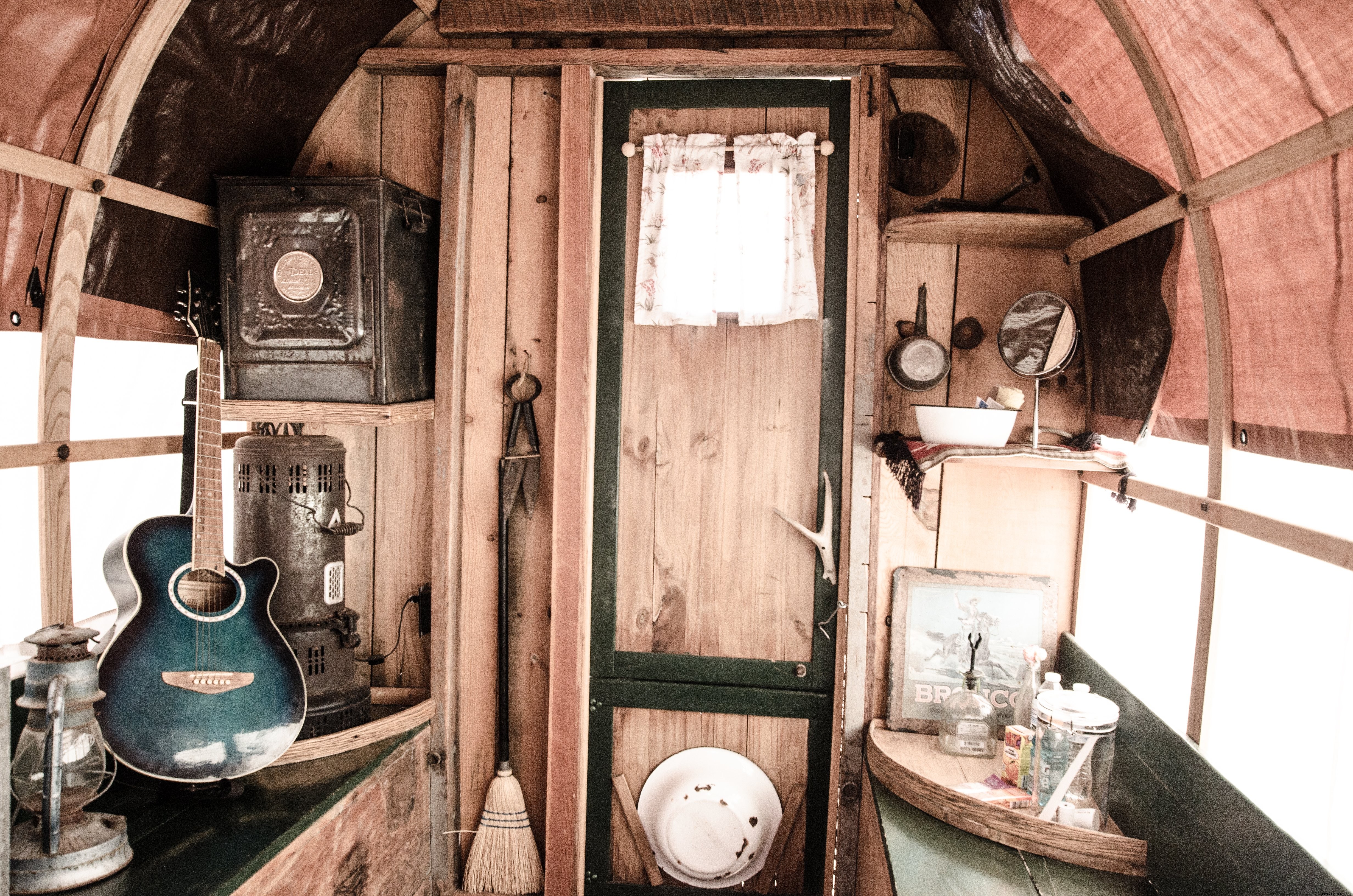Stunning Caravan Interior: Rustic Musical Instruments and Domestic Objects Photo