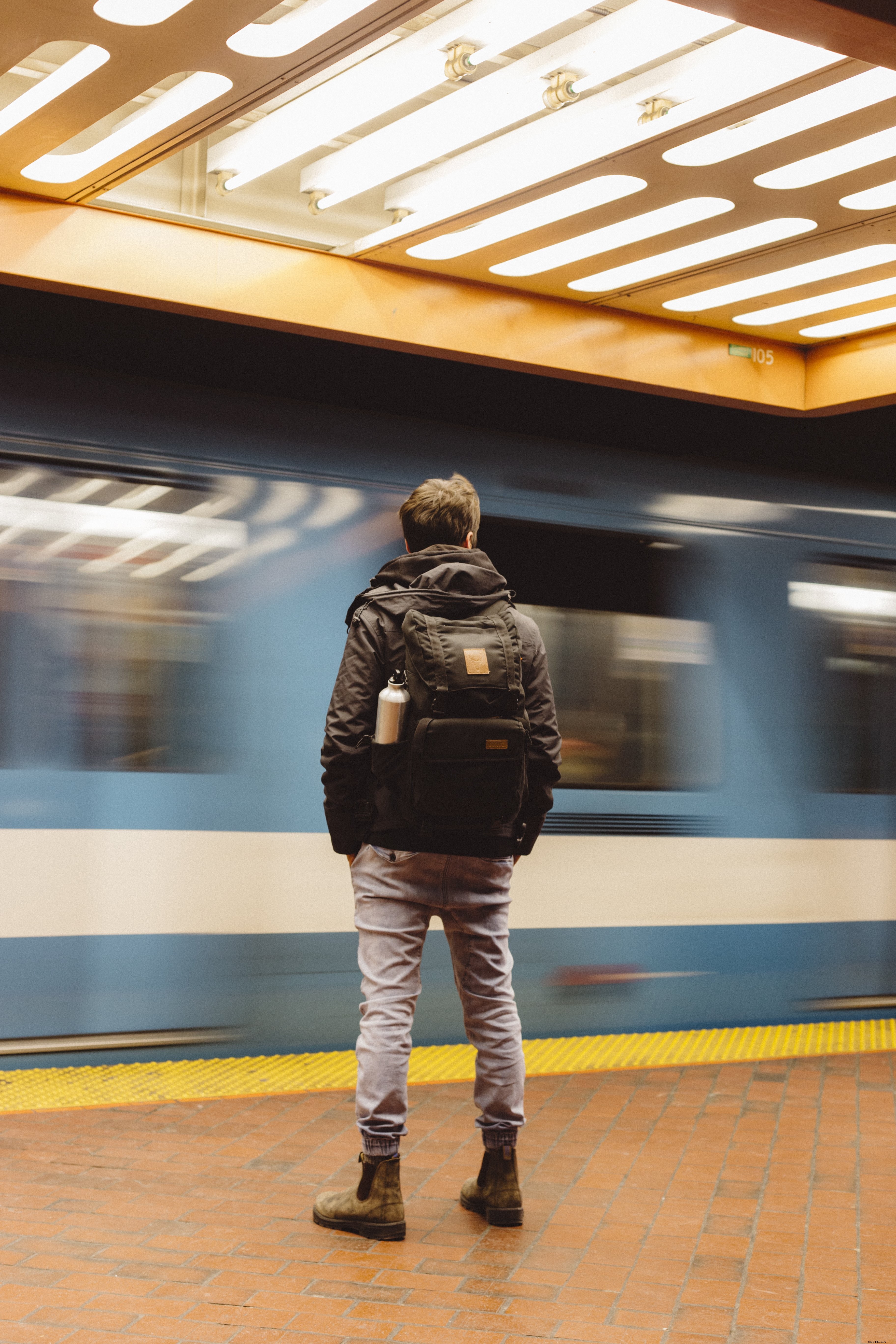Stunning Photo of a Commuter Waiting at Subway Platform