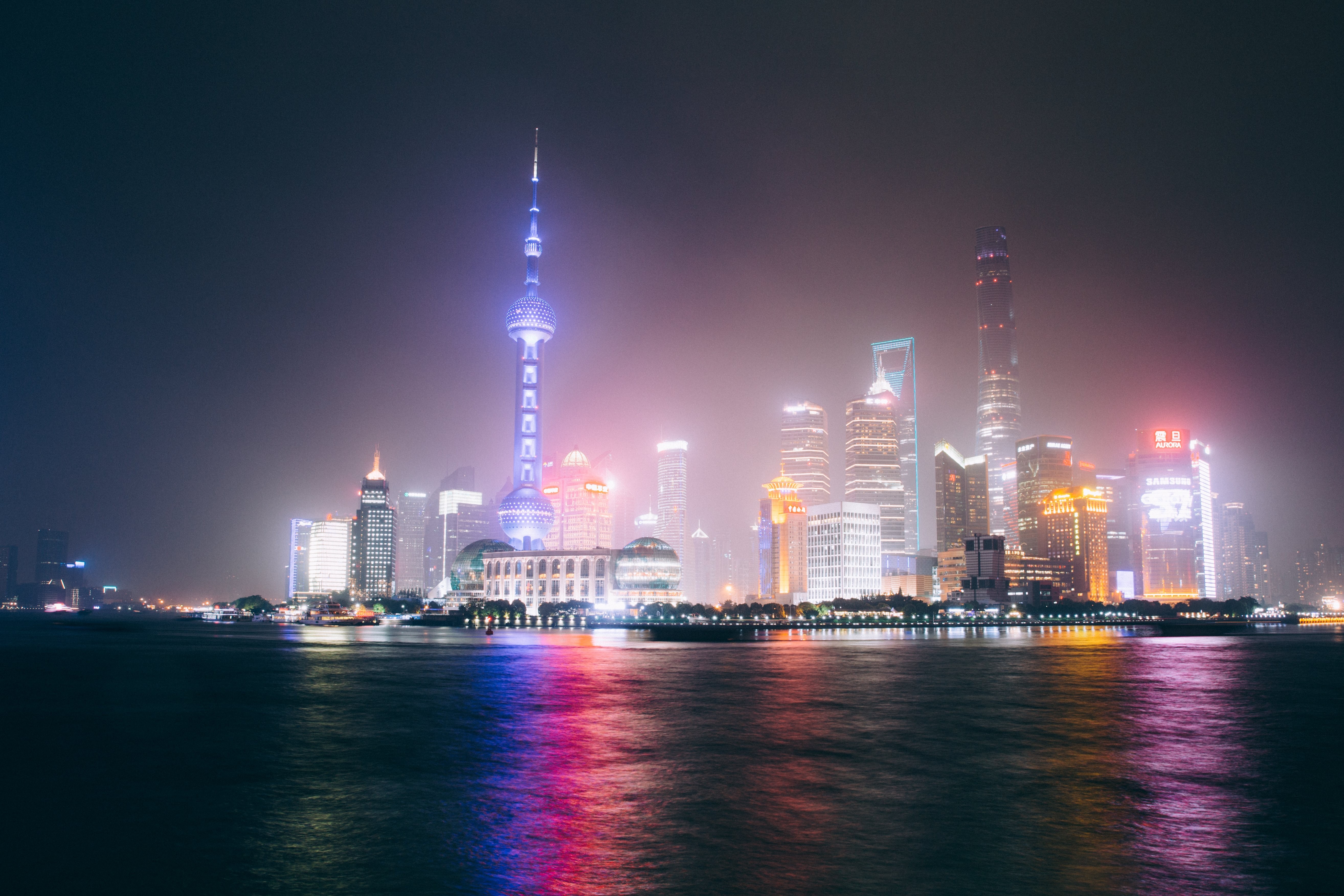 Stunning Shanghai Skyline: Radiant Lights Illuminating the Night Sky