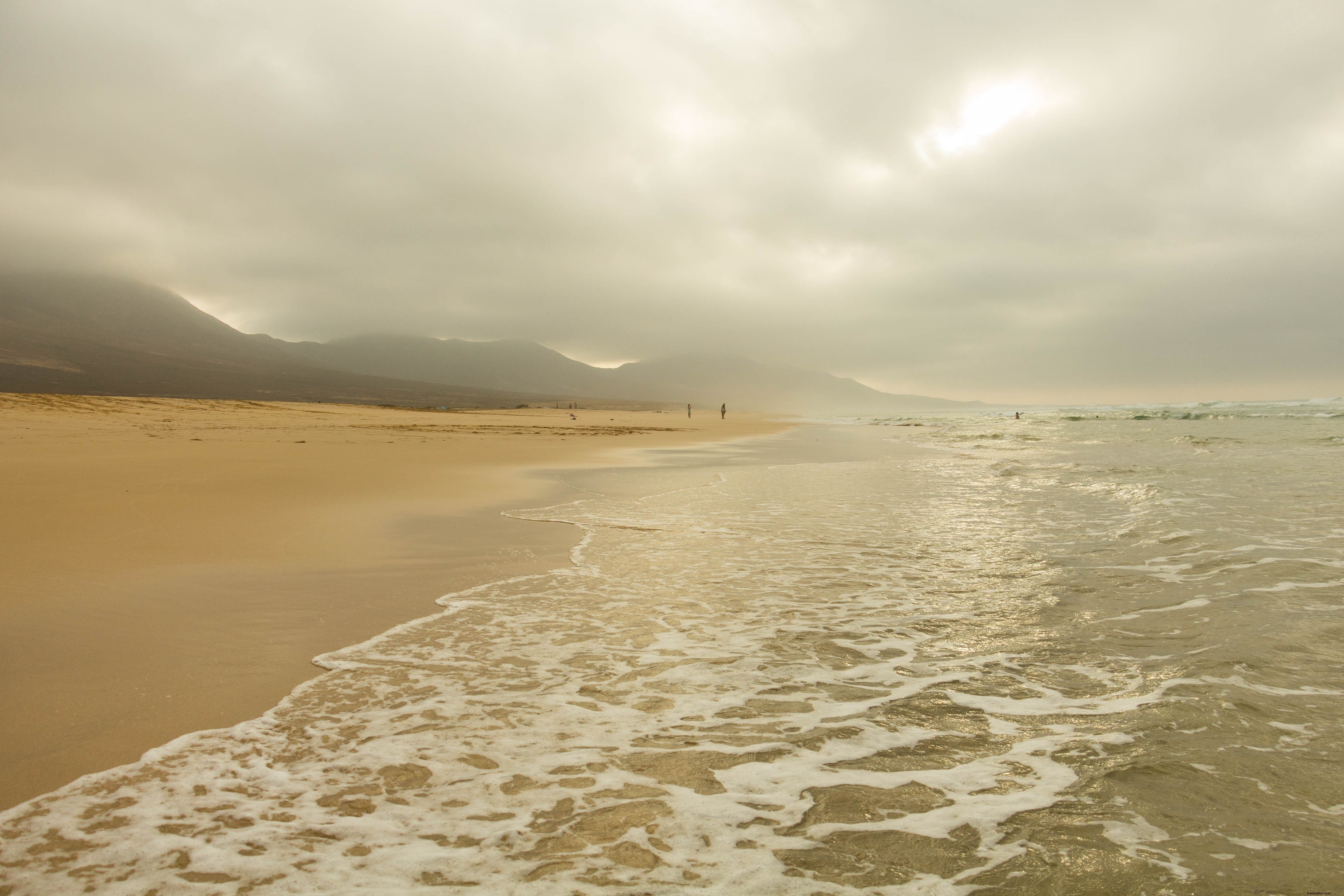 Stunning Low Clouds Over Pristine Sandy Beach – Professional Photo