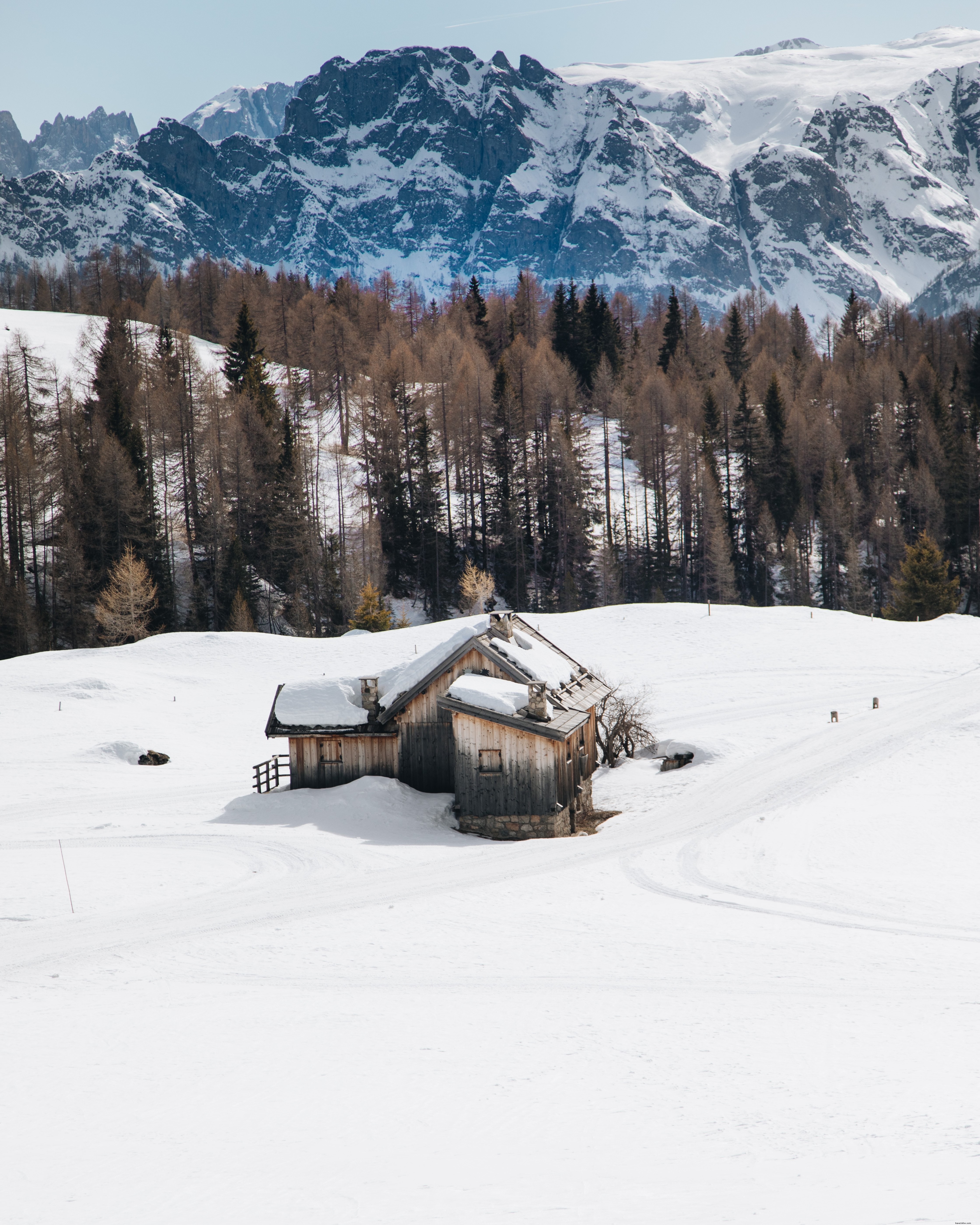 Serene Isolated Wooden Cabin in Snowy Wilderness Photo