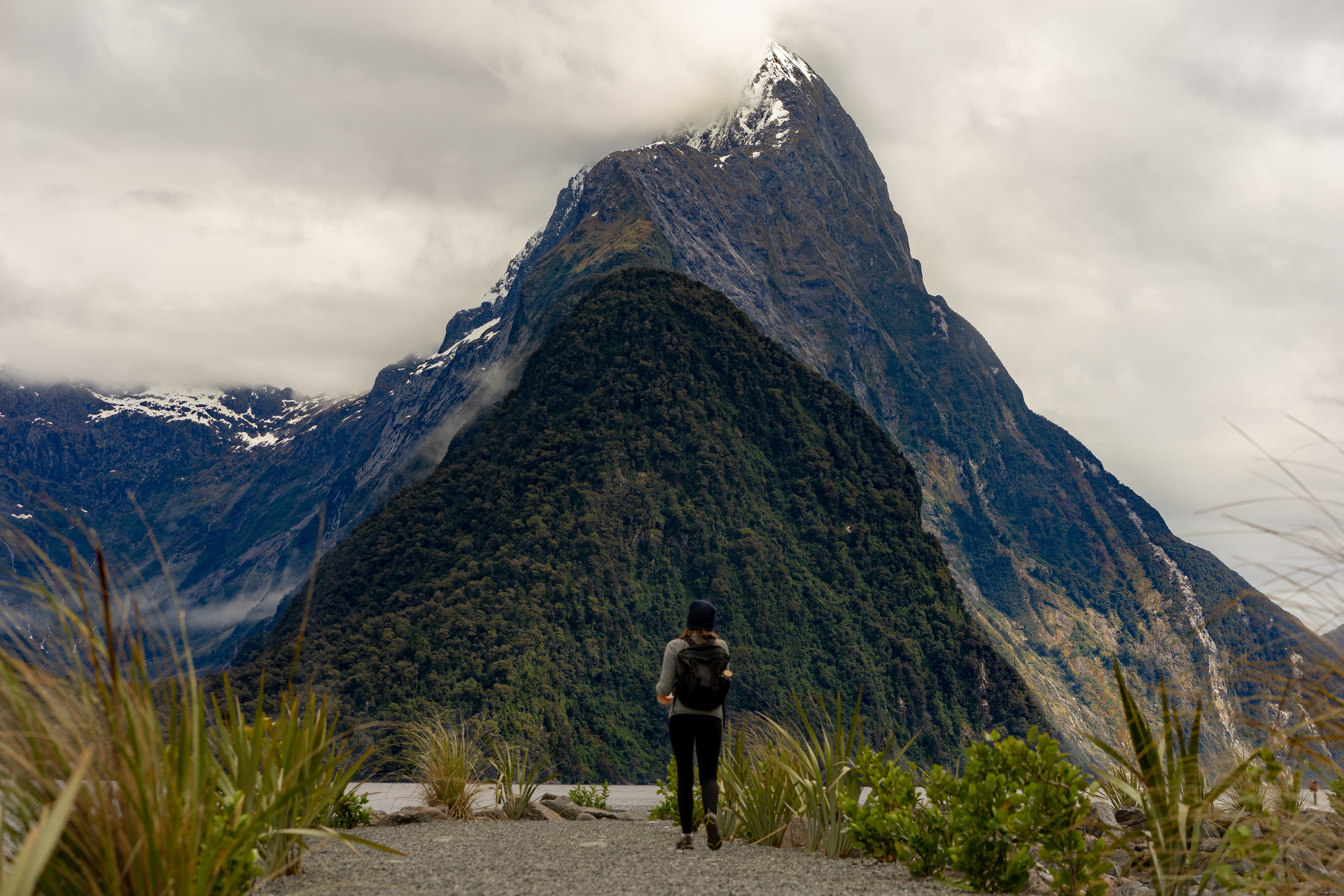 Breathtaking Photo: Hiker Gazing at Majestic Mountain Peak