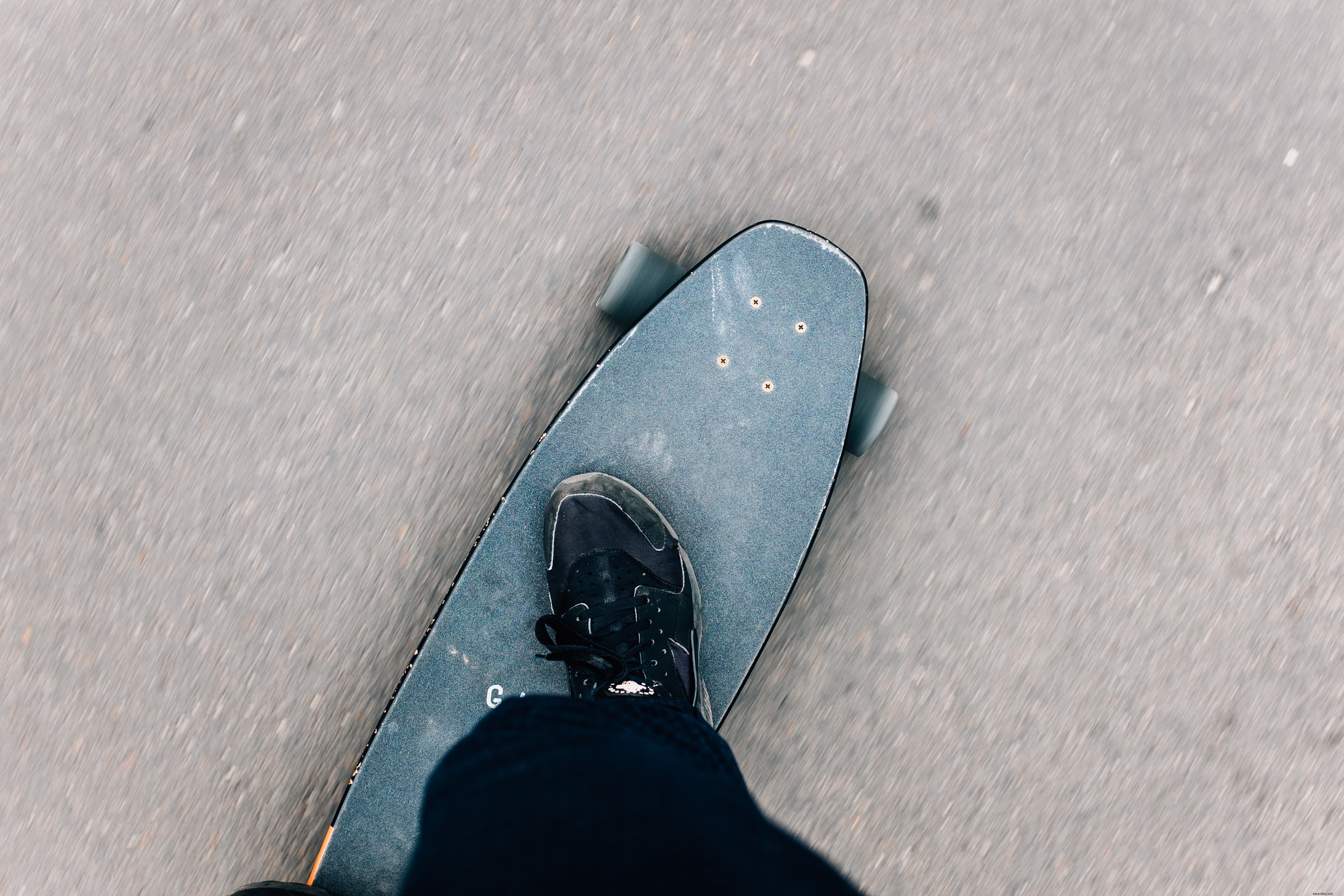 Overhead Shot of a Battered Skateboard: Striking Photo