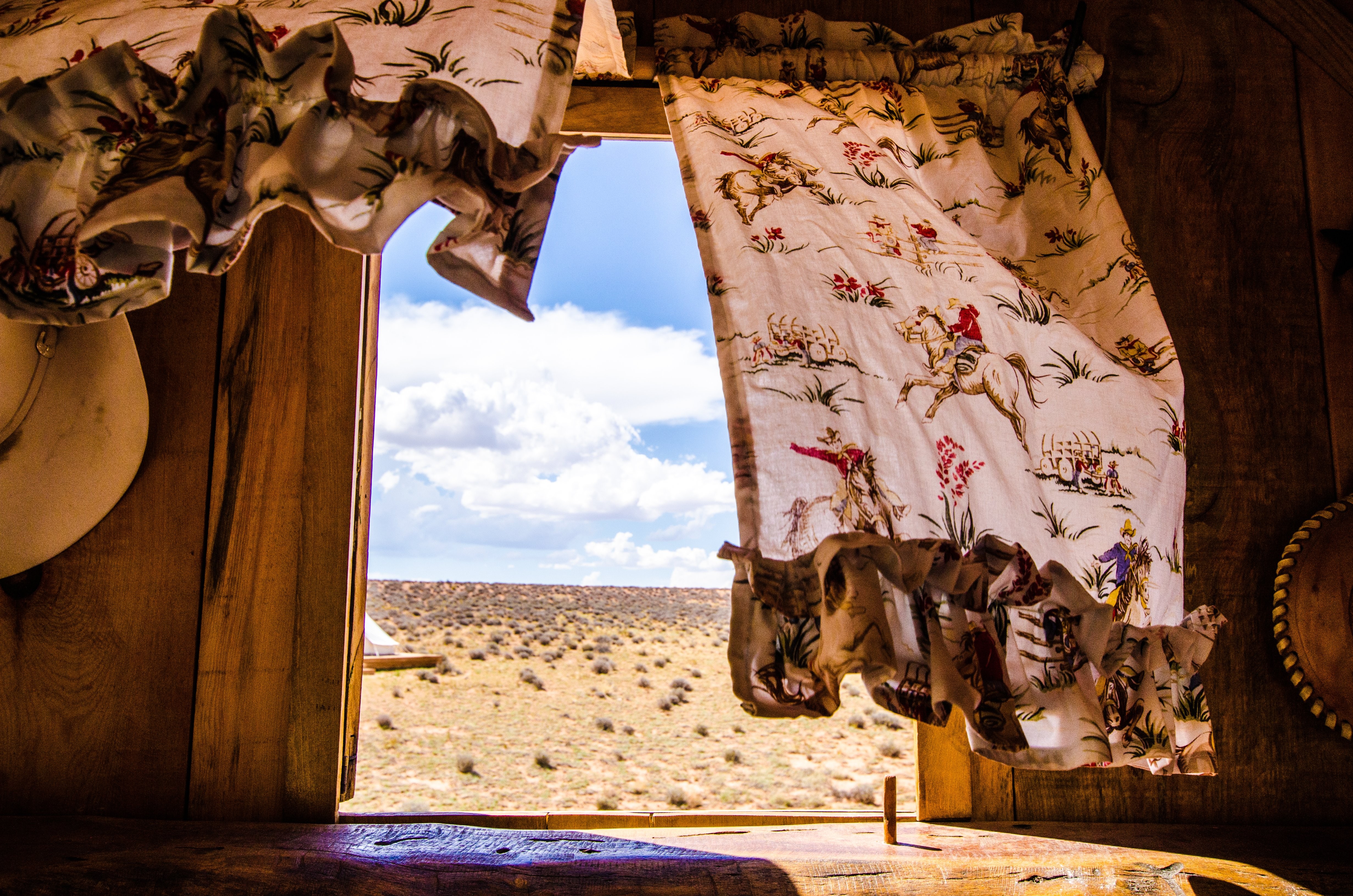 Breathtaking Wild West Plains: Scenic View from a Caravan Window Photo