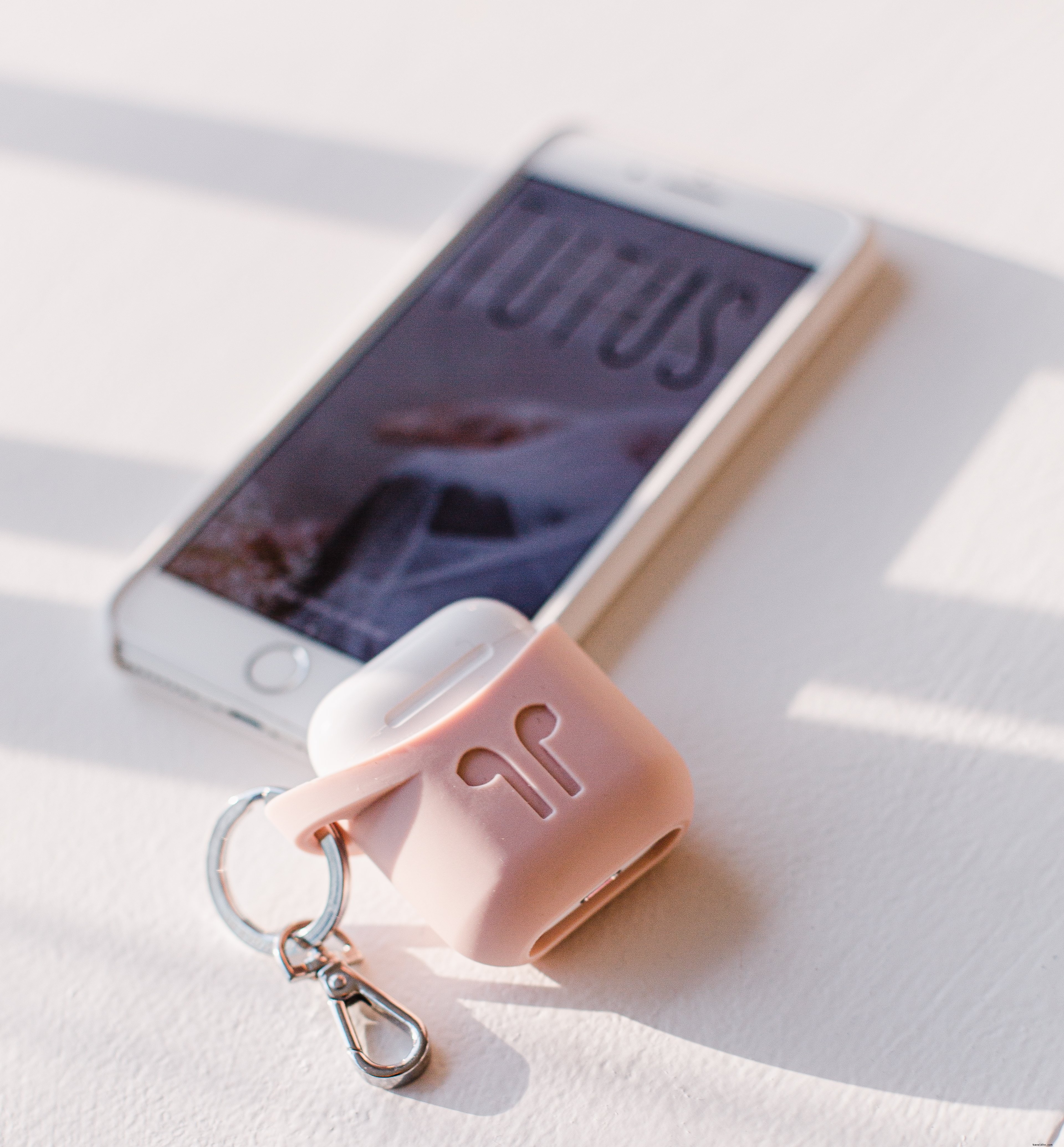 Stunning Sunlit Photo: Cell Phone and Wireless Earbuds