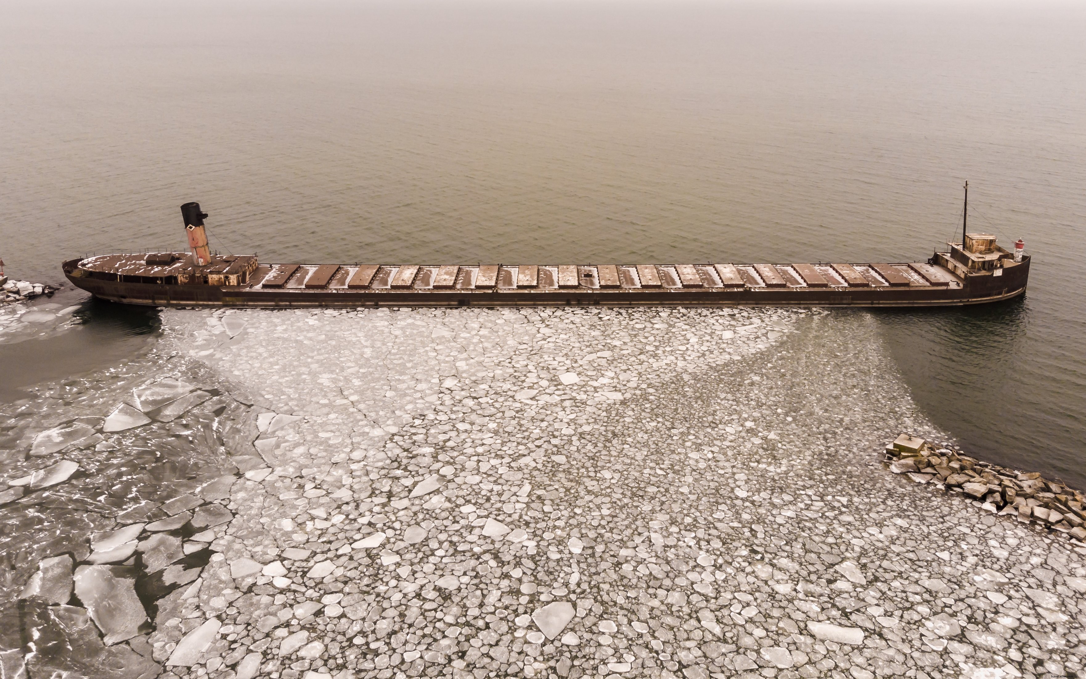 Stunning Photo: Tanker Ship Blocks Ice Drift in Misty Waters