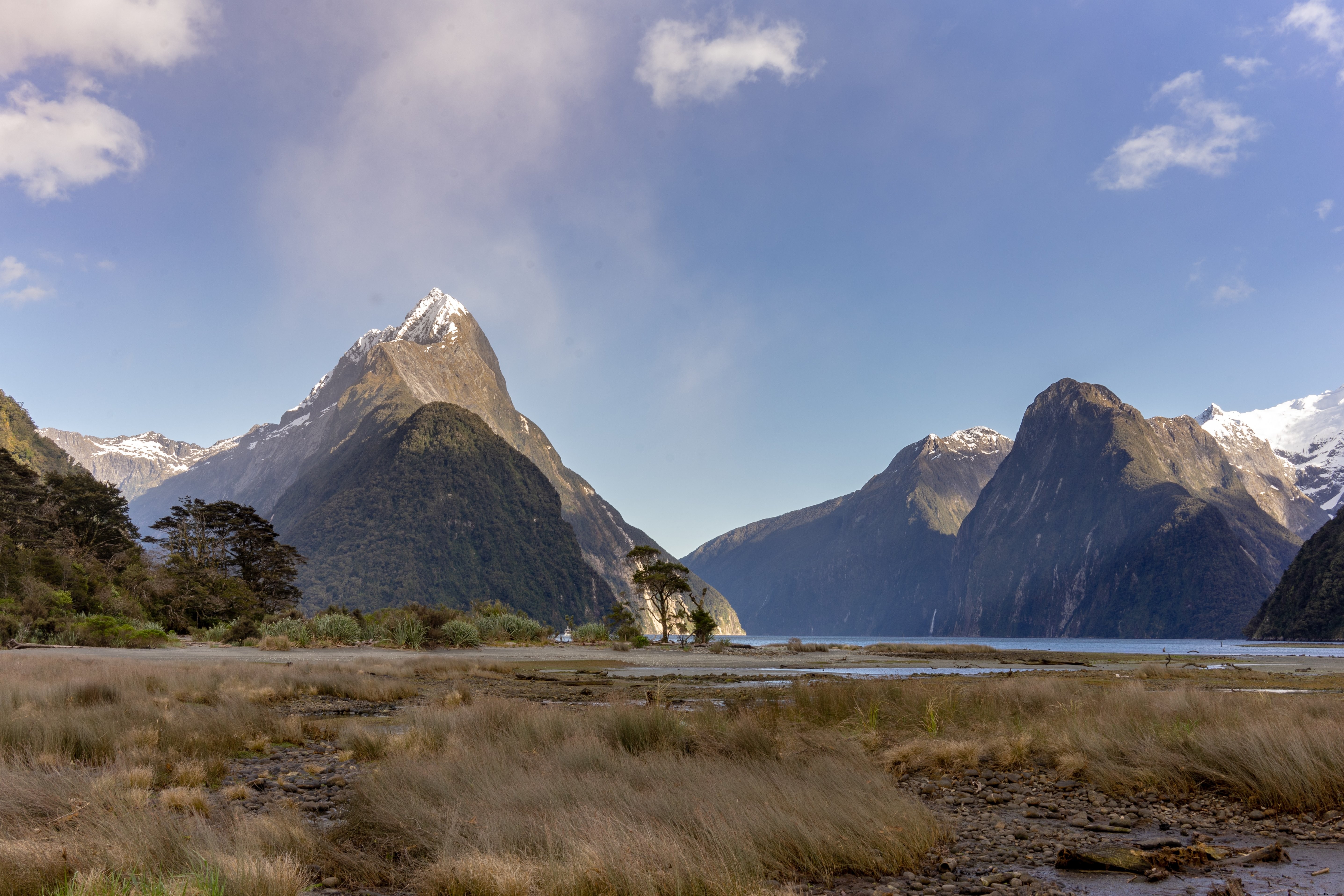 Stunning Snow-Capped Mountains Under Crystal Clear Blue Skies