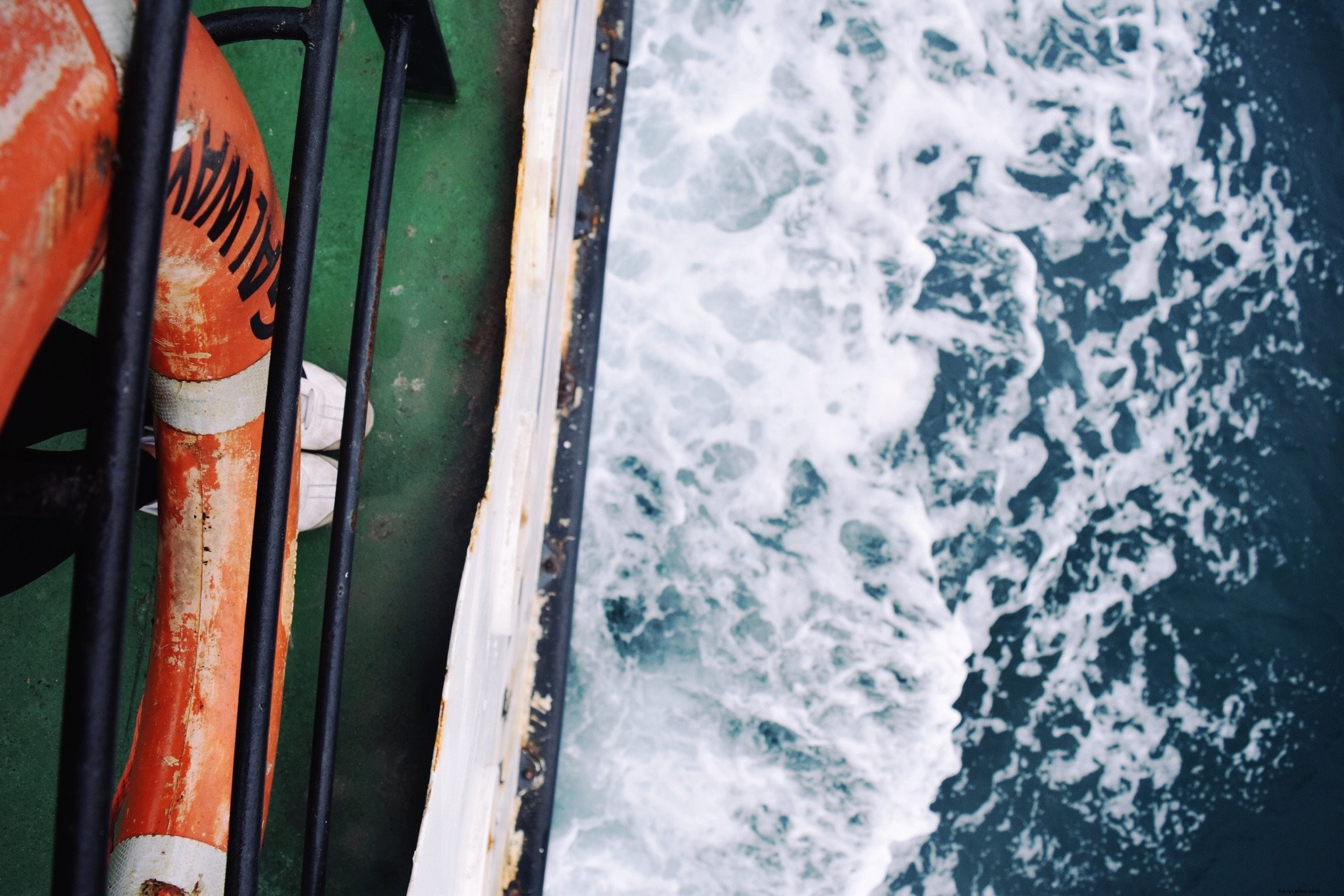 Stunning Aerial View of Boat Sailing on the Open Sea