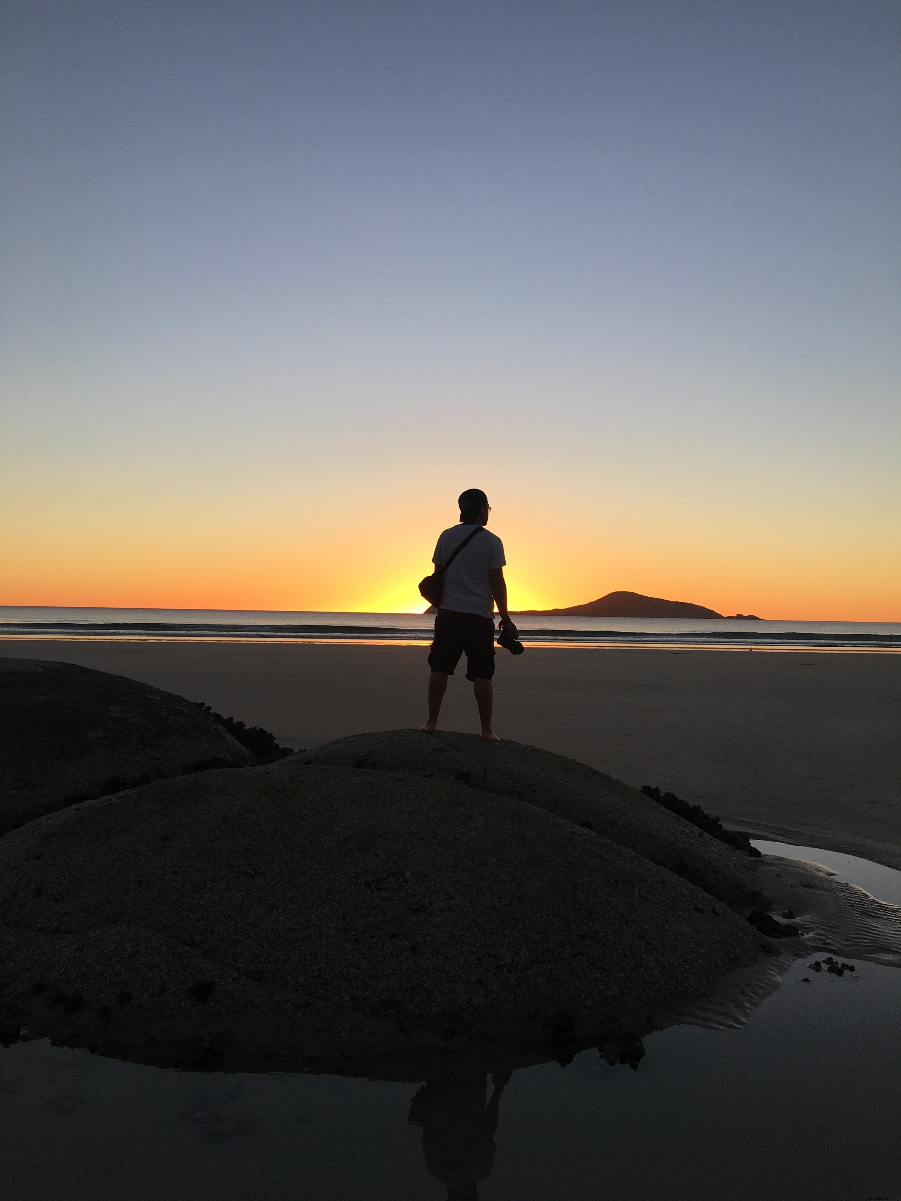 Stunning Beach Sunset Photo: Man Watching from Dune