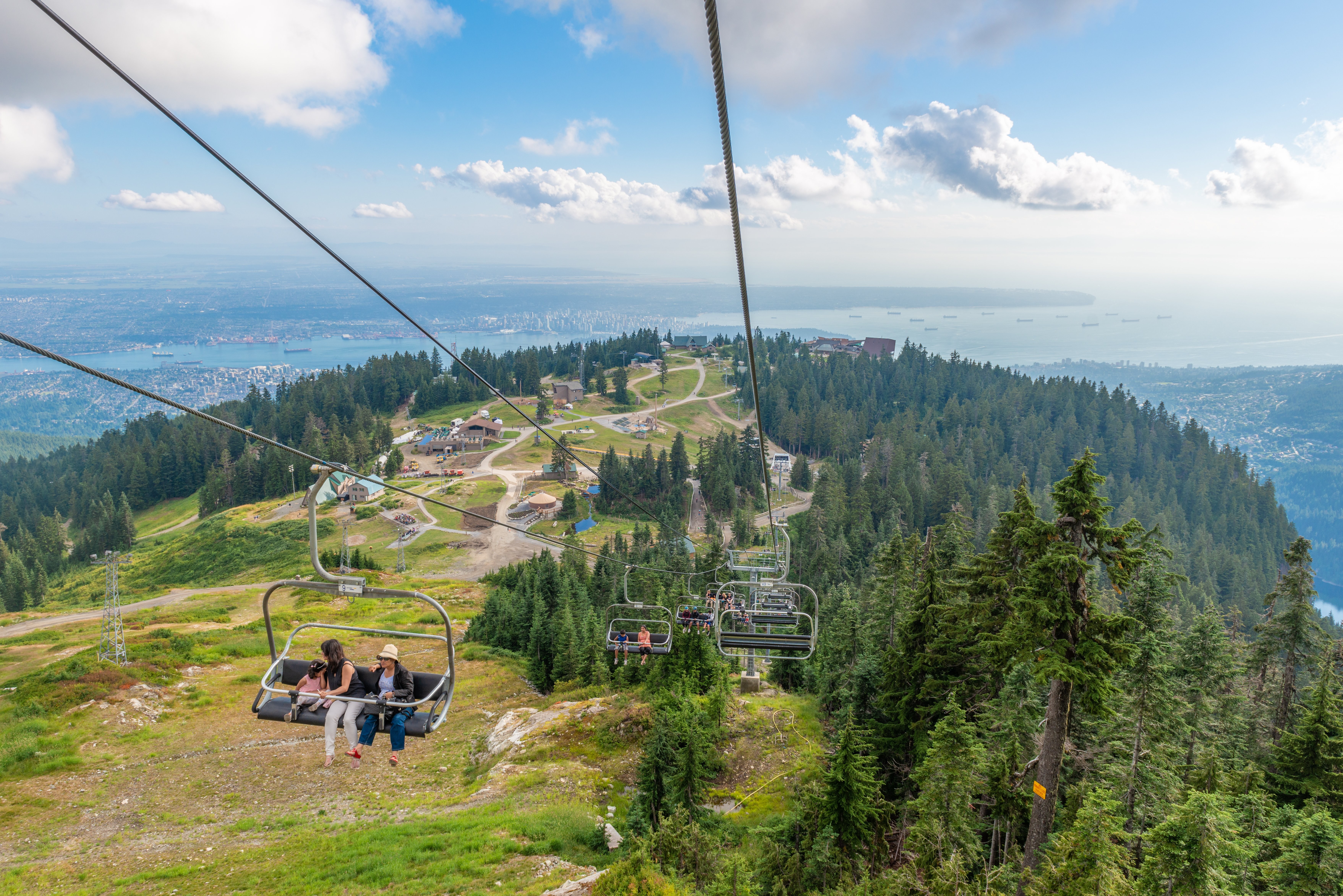 Scenic Chairlift Ascent to Mountain Summit Near Vancouver – Stunning Photo