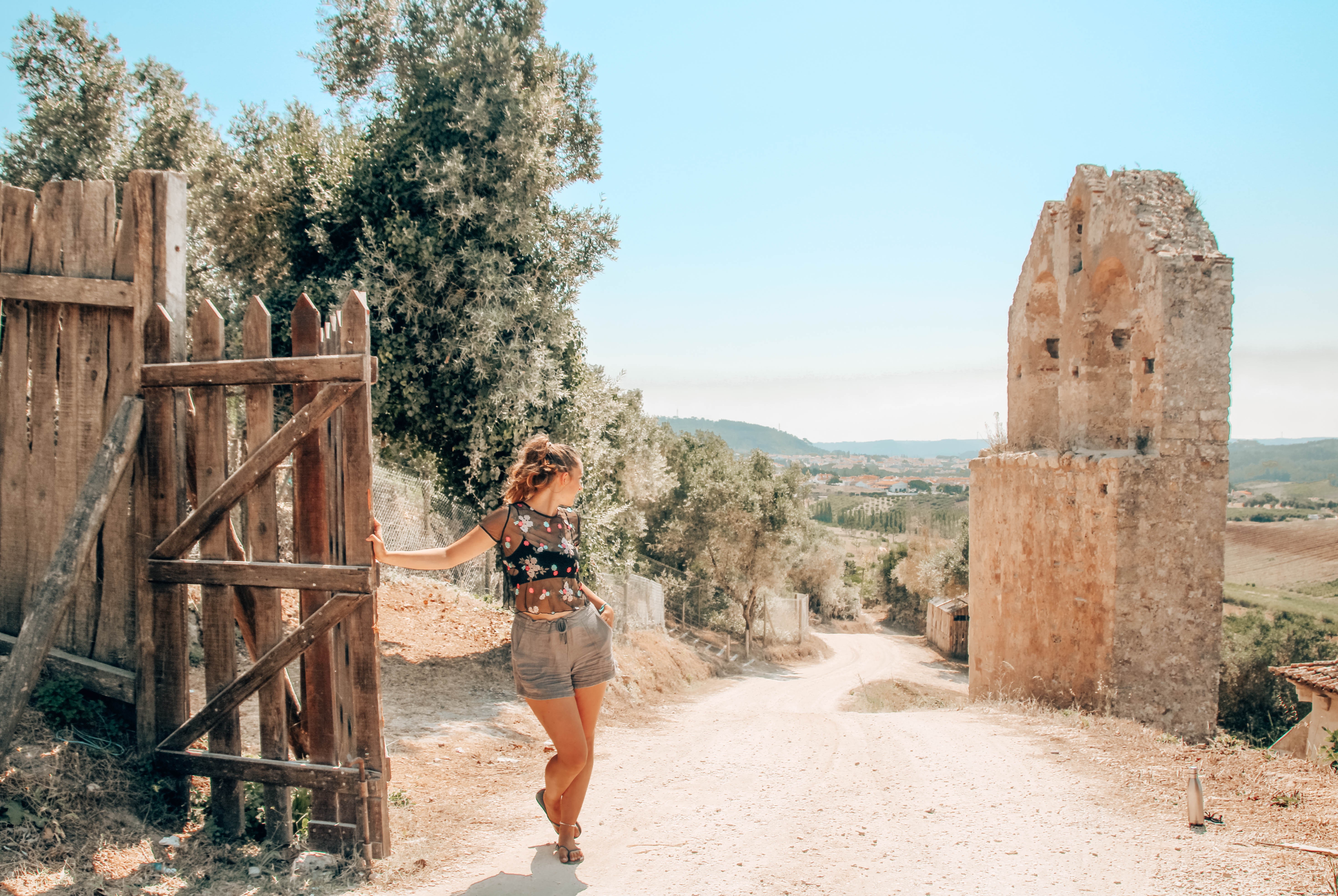 Serene Pause: Woman Rests During Scenic Countryside Hike – Stunning Photo