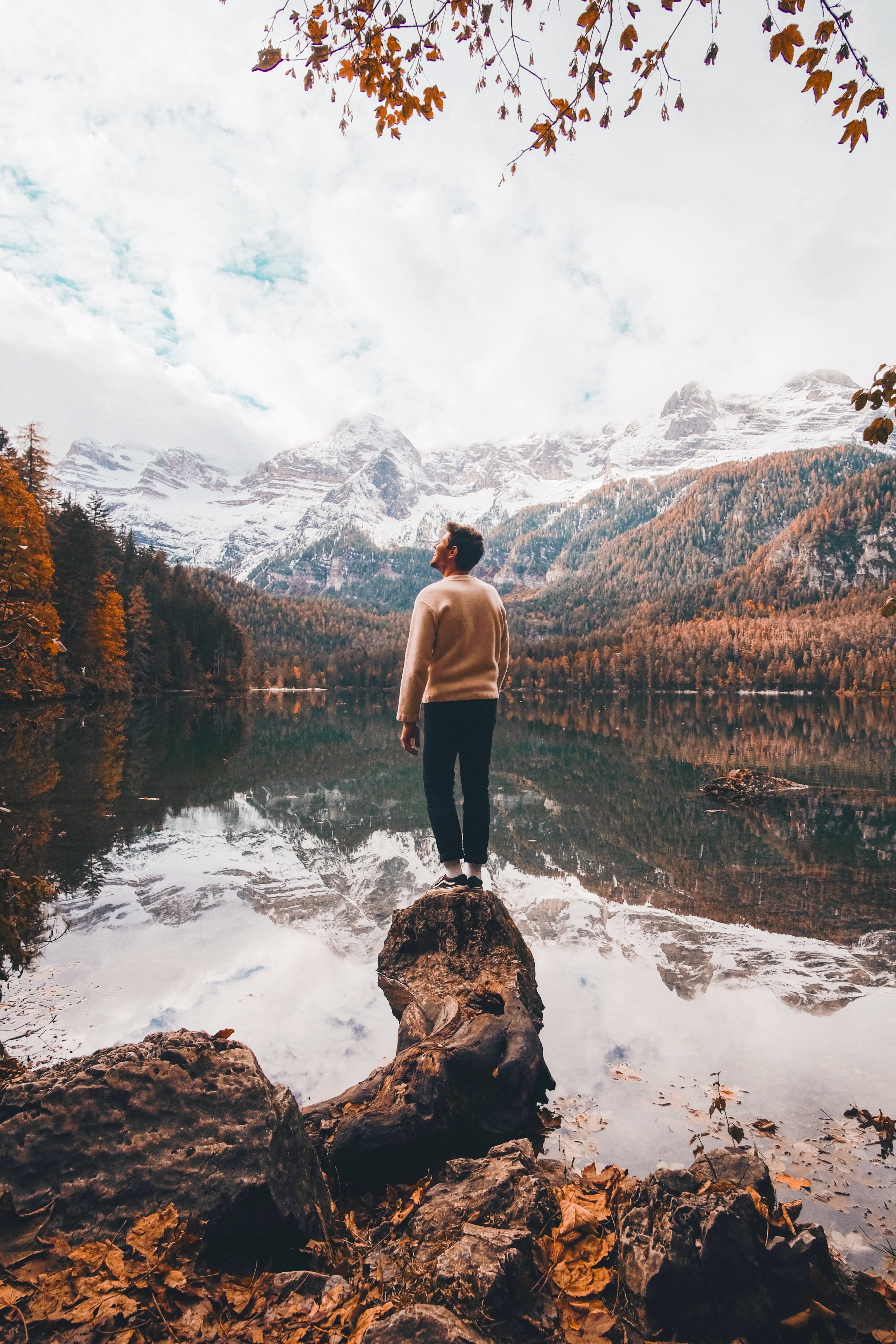 Breathtaking Autumn Vista: Person Overlooking Majestic White Mountains