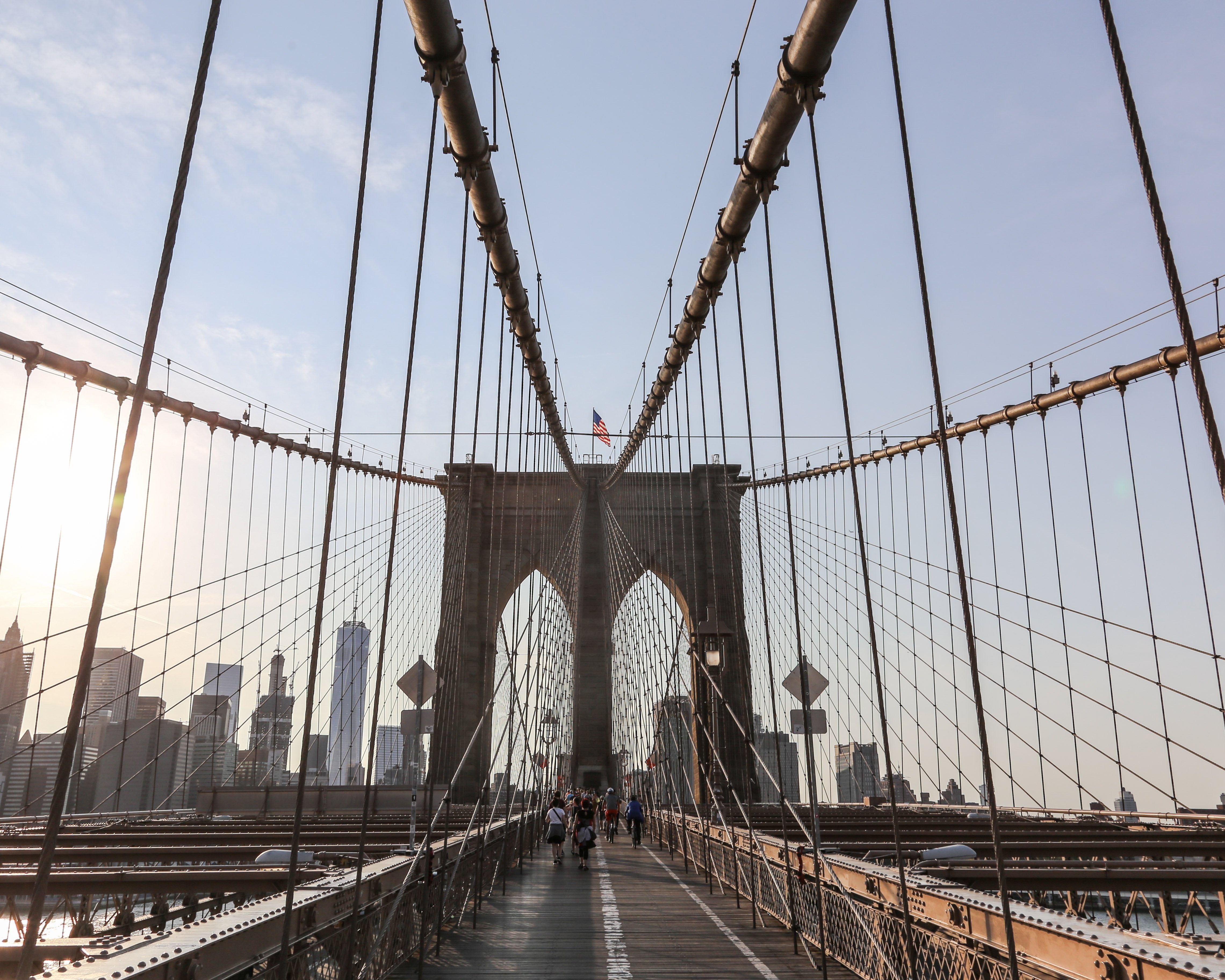 Stunning Waving Flag Framed by Bridge Wires Photo