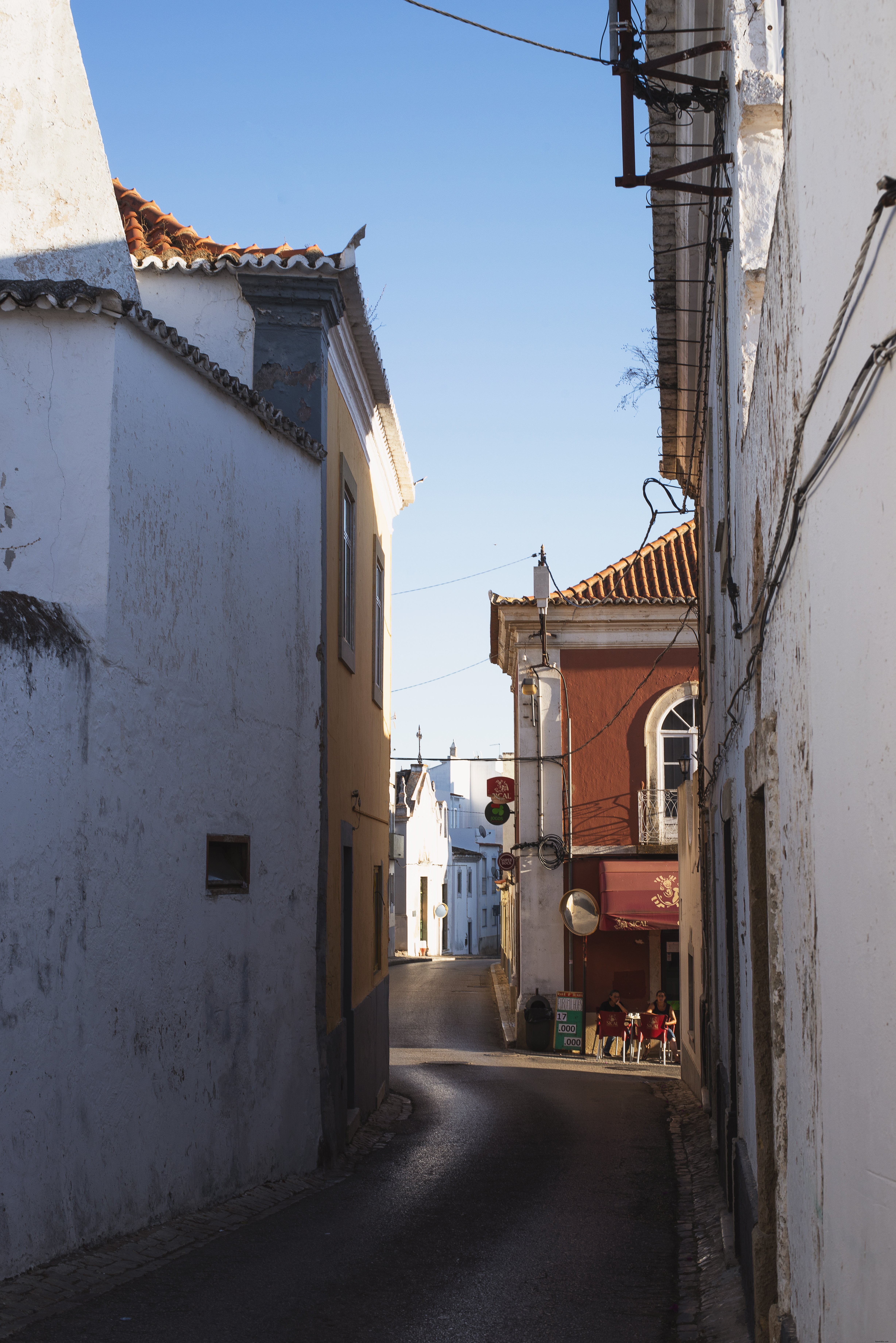 Captivating Photo of a Shadowy Street Sheltered from Sunlight