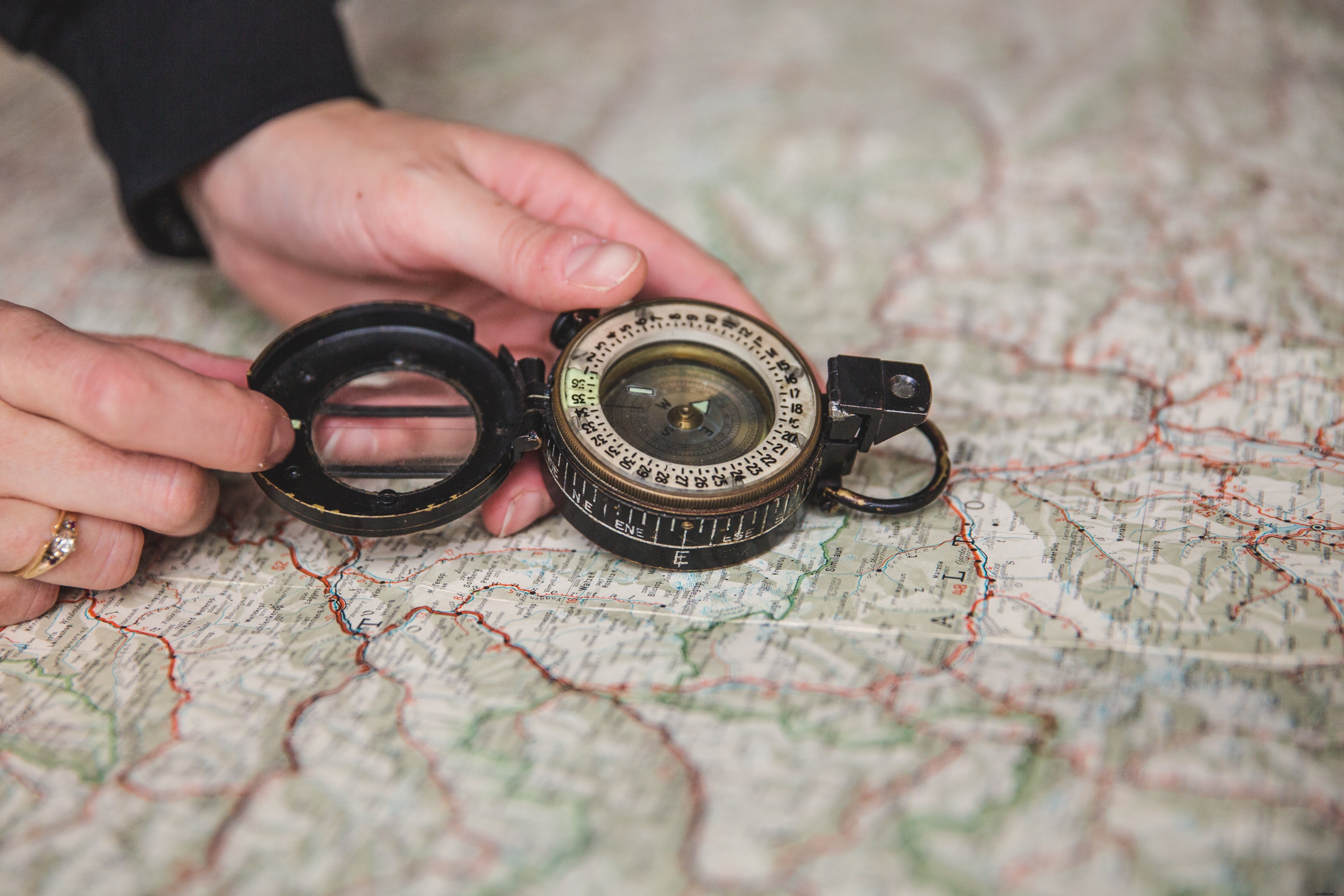 Young Woman with Compass Over Map - Stunning Adventure Photo