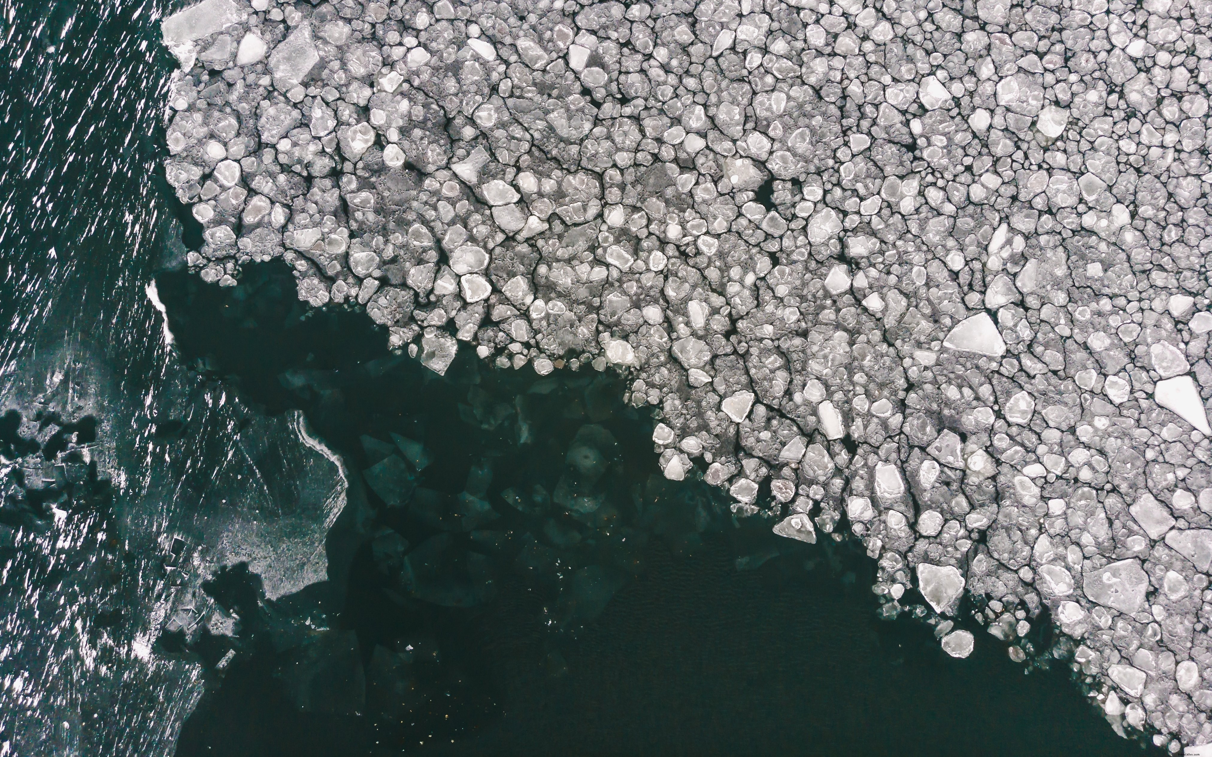 Stunning Photo: Ice Breaking Apart on Crystal Waters