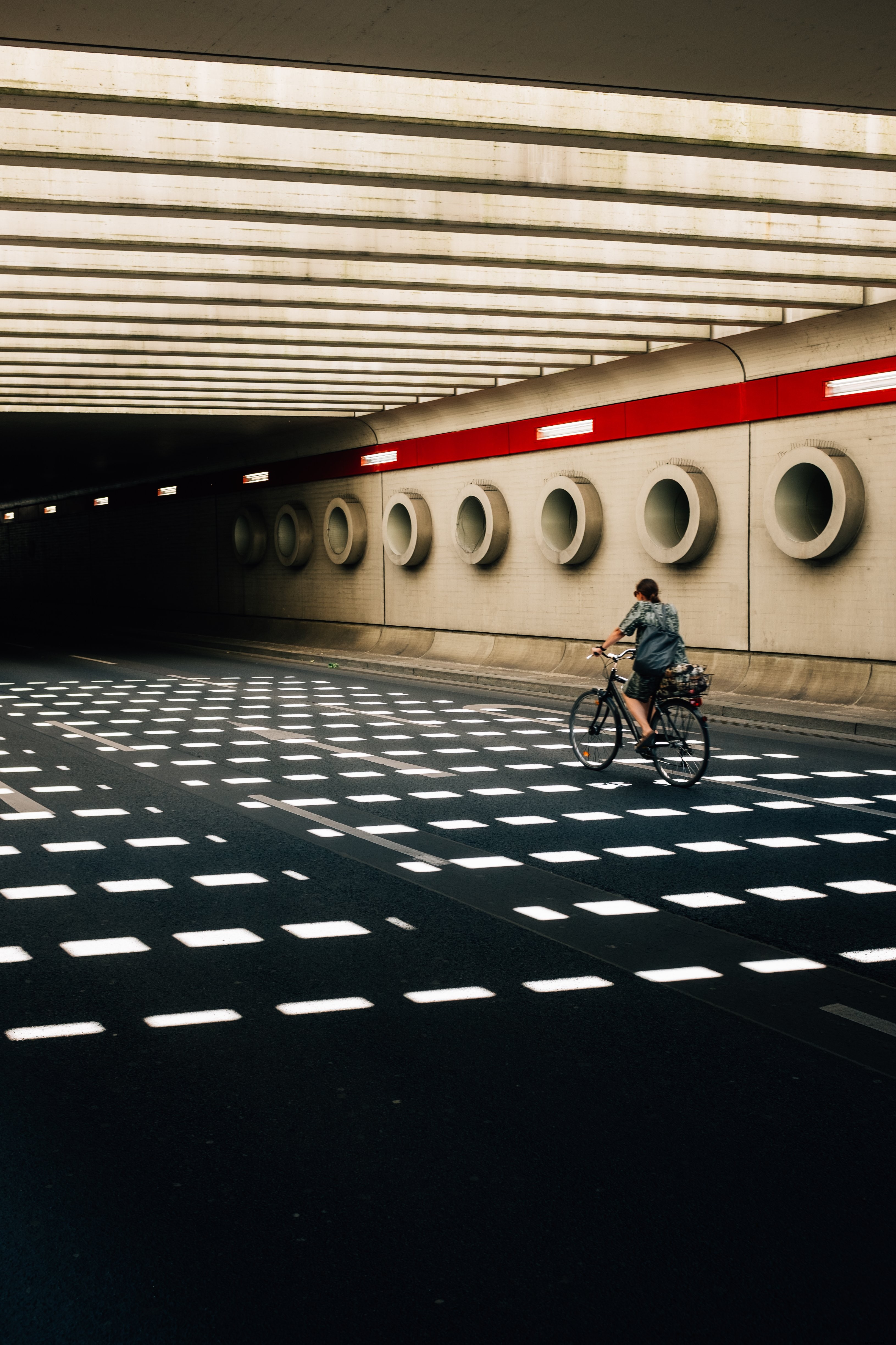 Thrilling Bike Ride Through Underground Tunnel: Stunning Photo