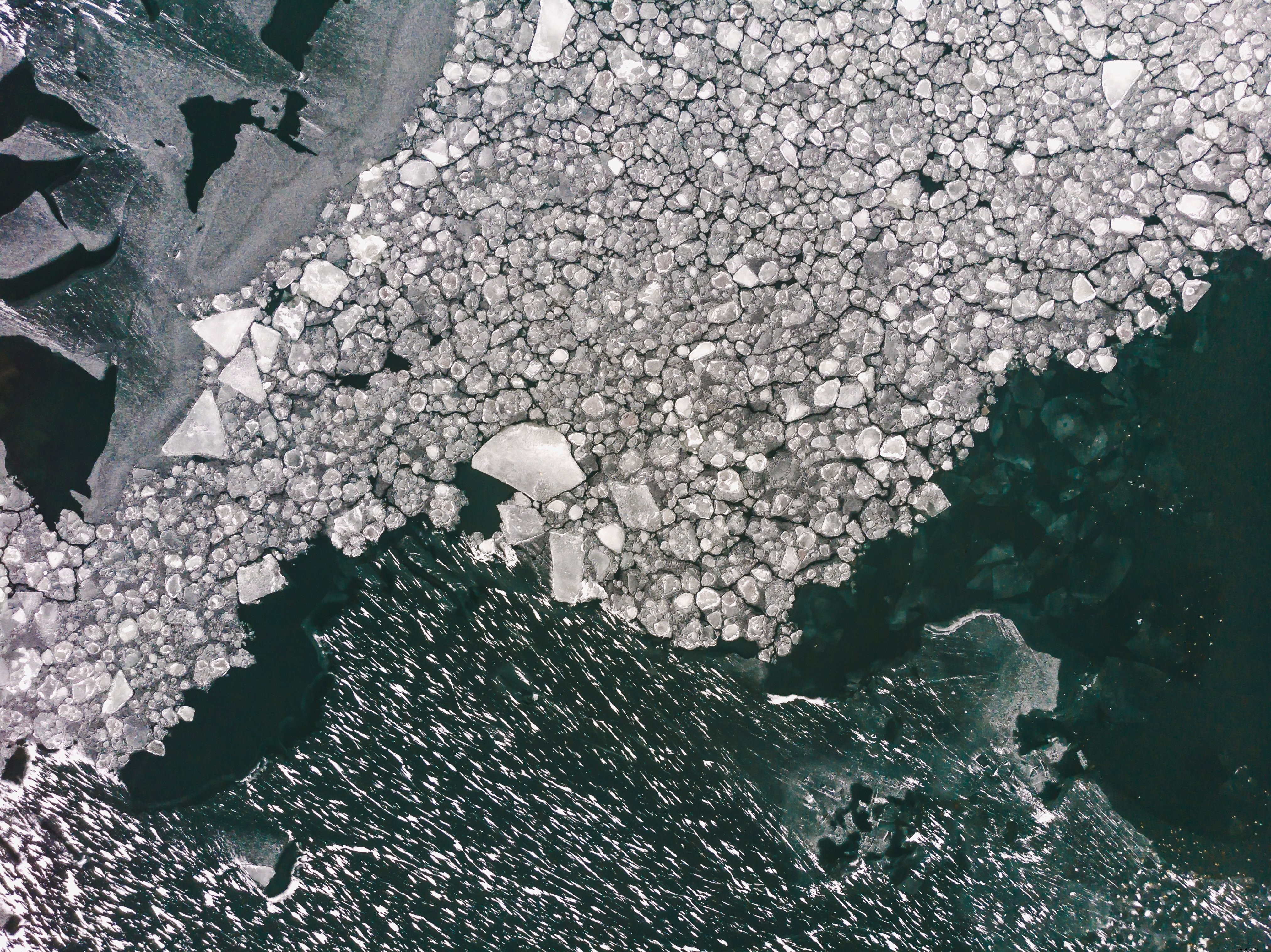 Stunning Photo: Ice Breaking Apart on Serene Waters