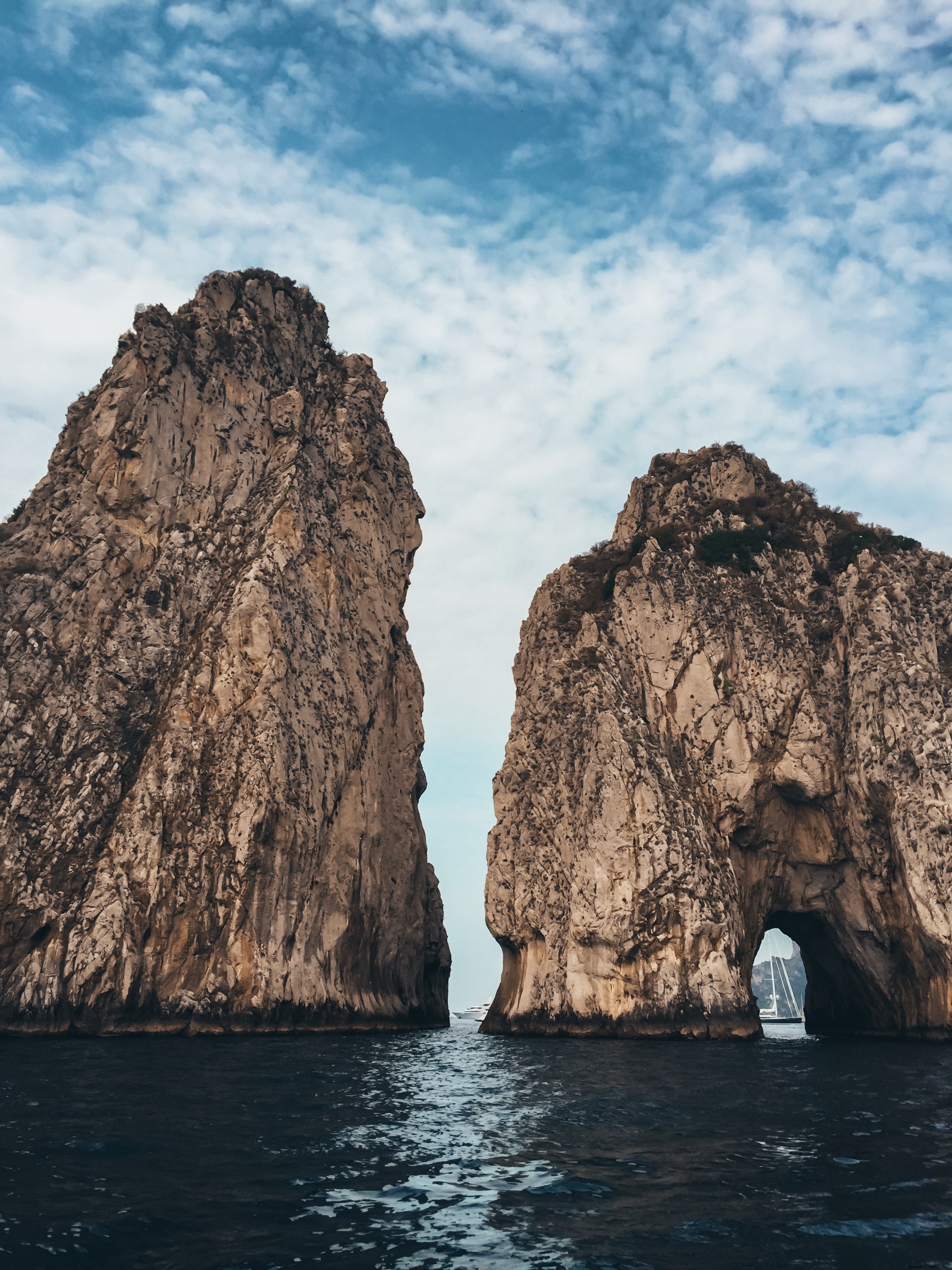 Majestic Tall Rock Formations Guarding a Serene Bay – Stunning Seascape Photo