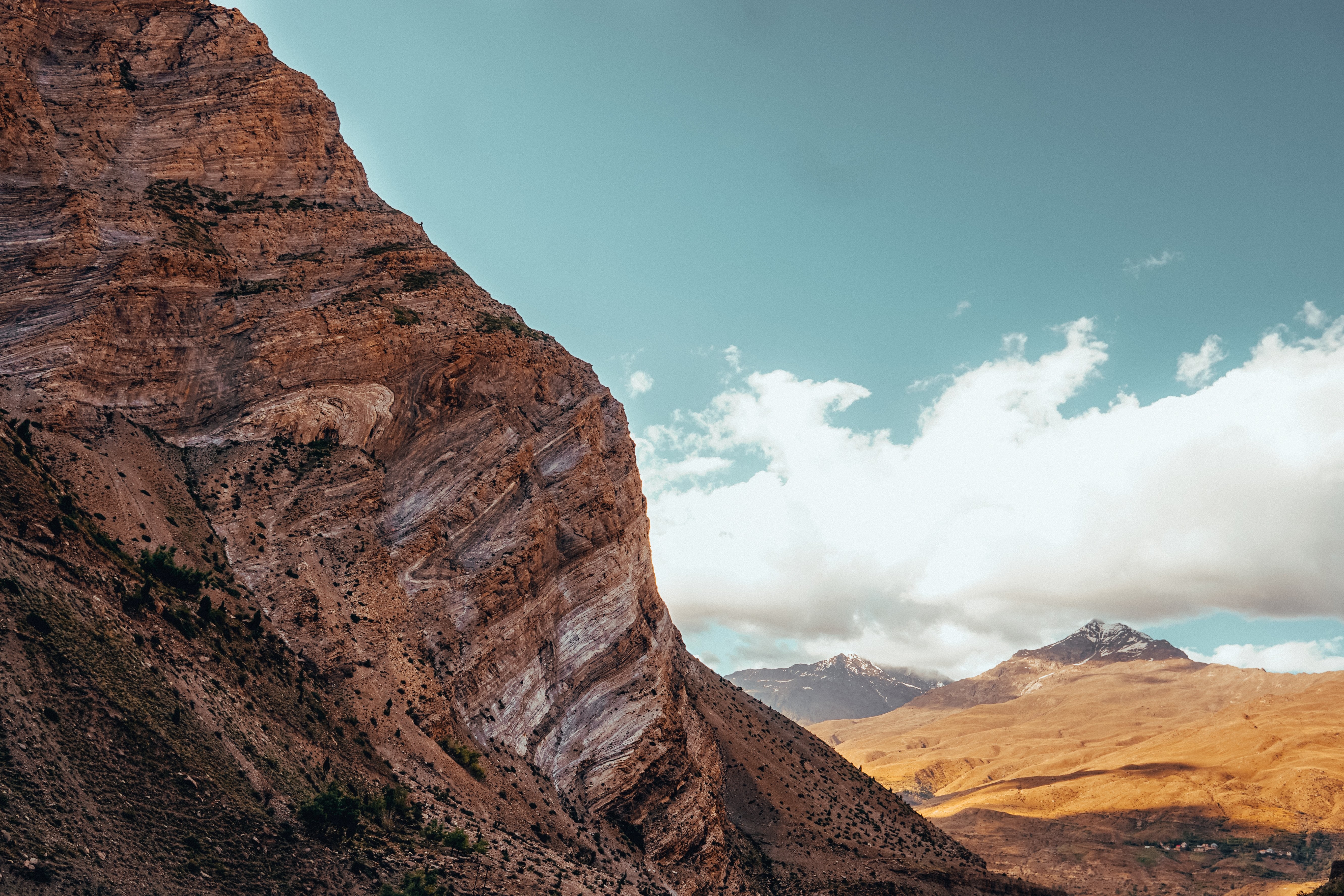 Sheltered by Rugged Rocks Under a Deep Blue Sky: Stunning Landscape Photo