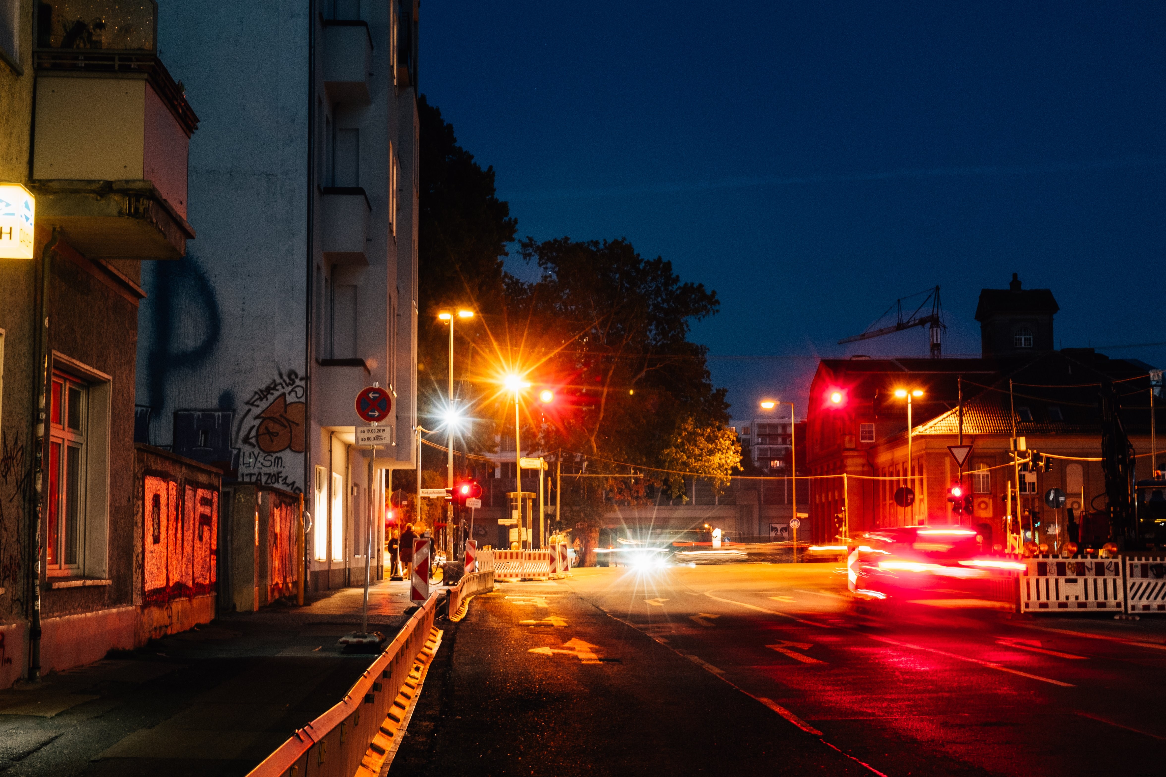 Stunning Illuminated City Street at Night – Vibrant Urban Nightscape Photo