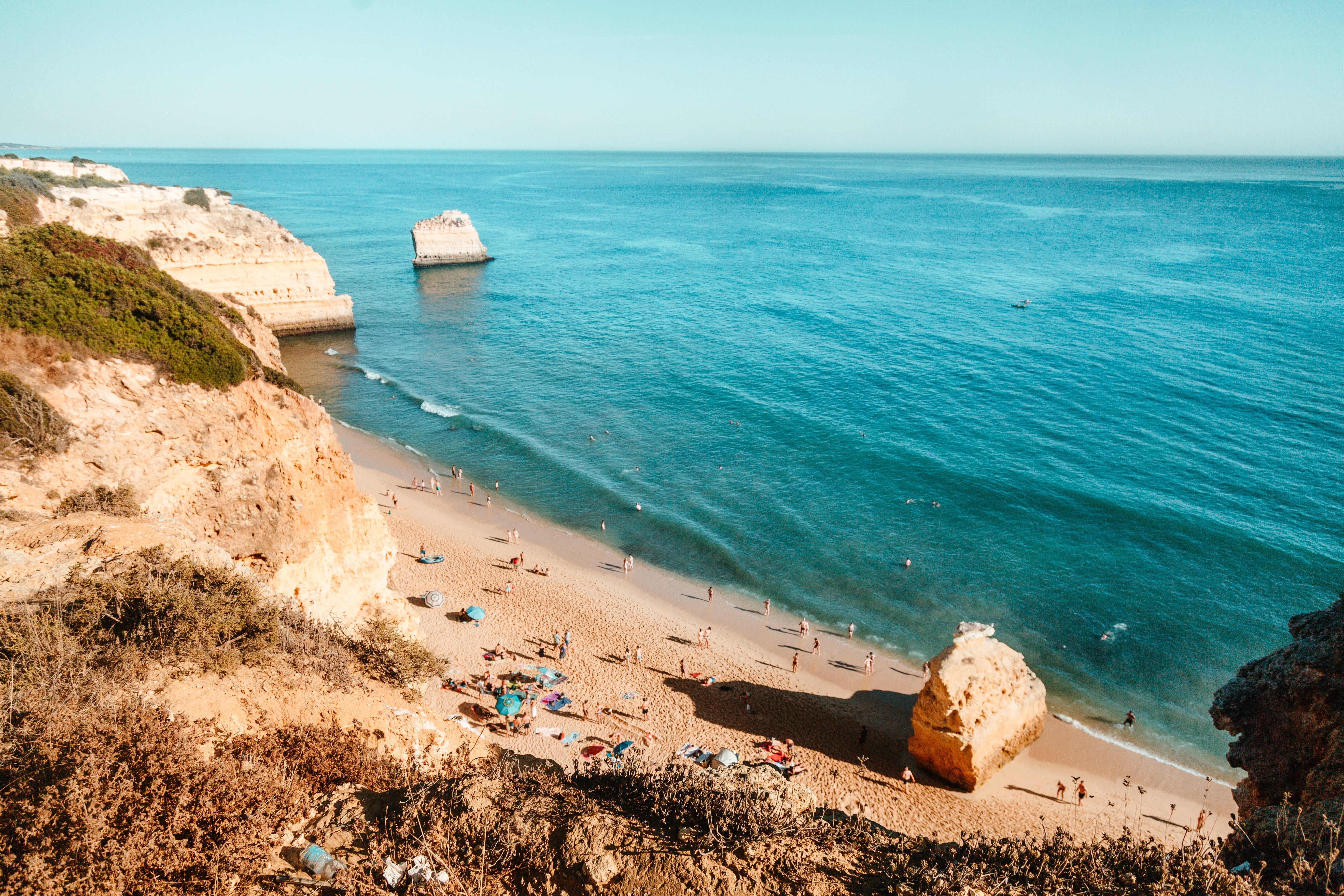 Stunning Photo: Rocky Outcrops Extending into Serene Waters