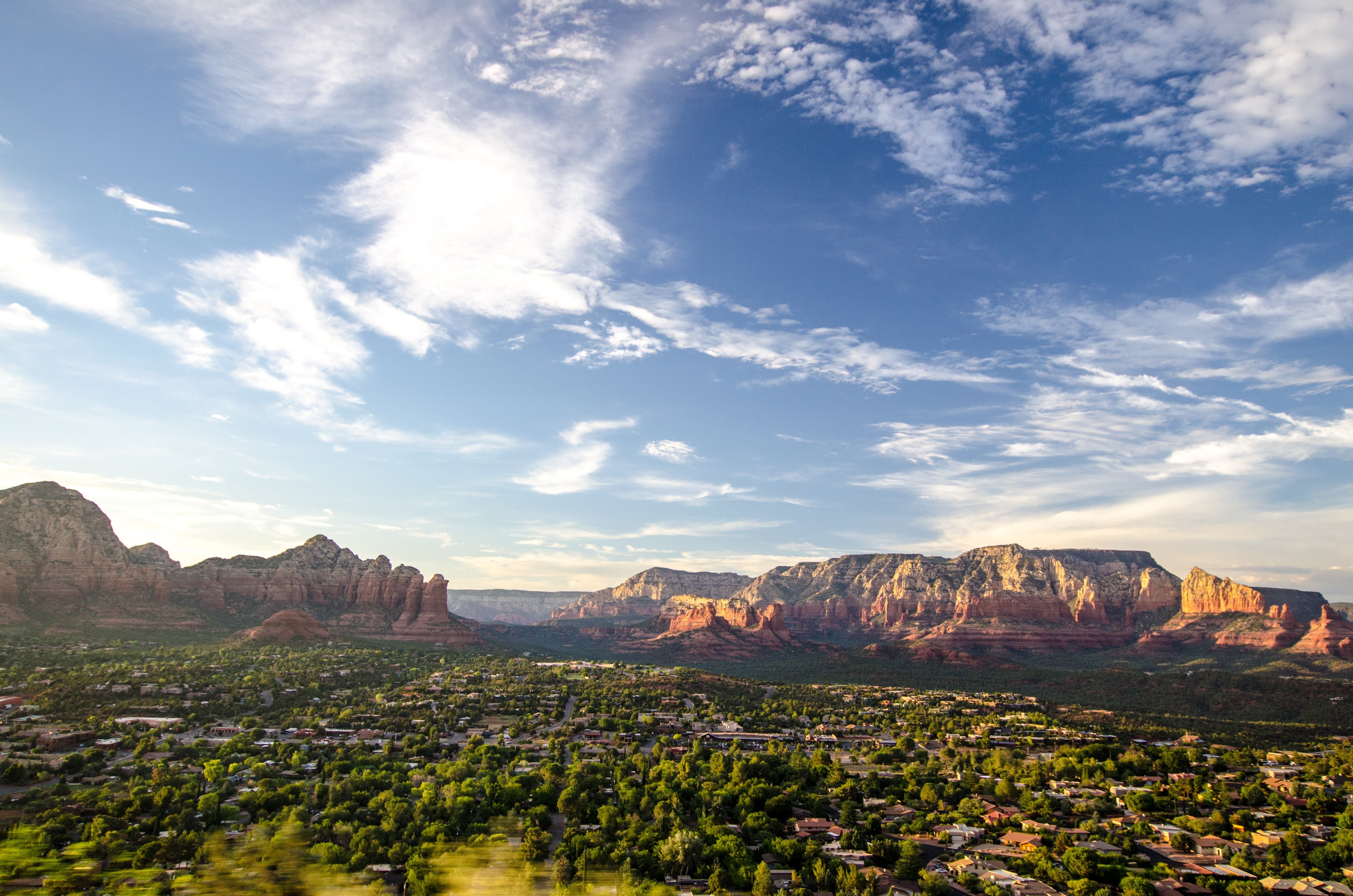 Stunning Photo: Quaint Plains Town Encircled by Majestic Rocky Mountains