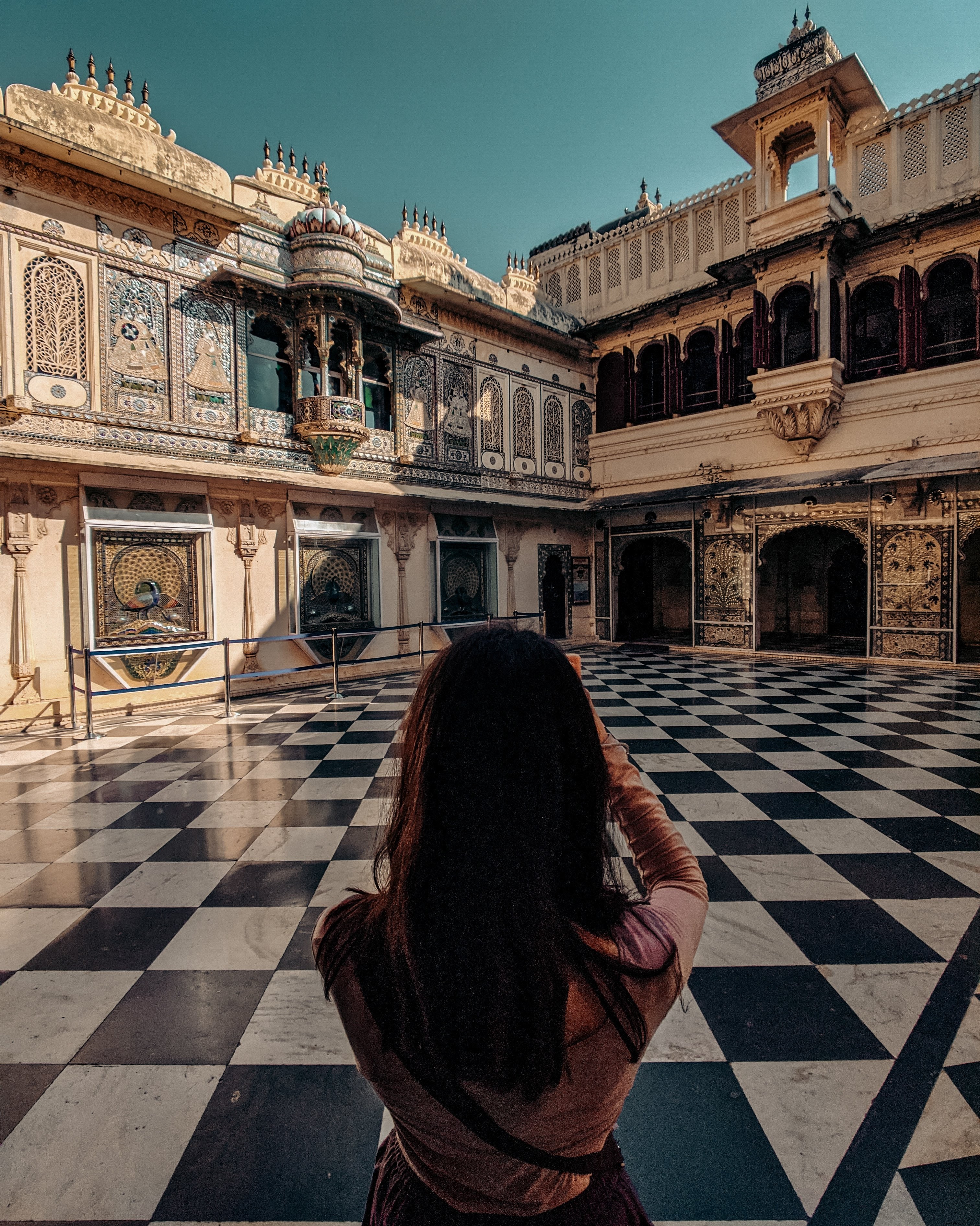 Elegant Woman Captures Stunning Architectural Beauty in Mesmerizing Photo