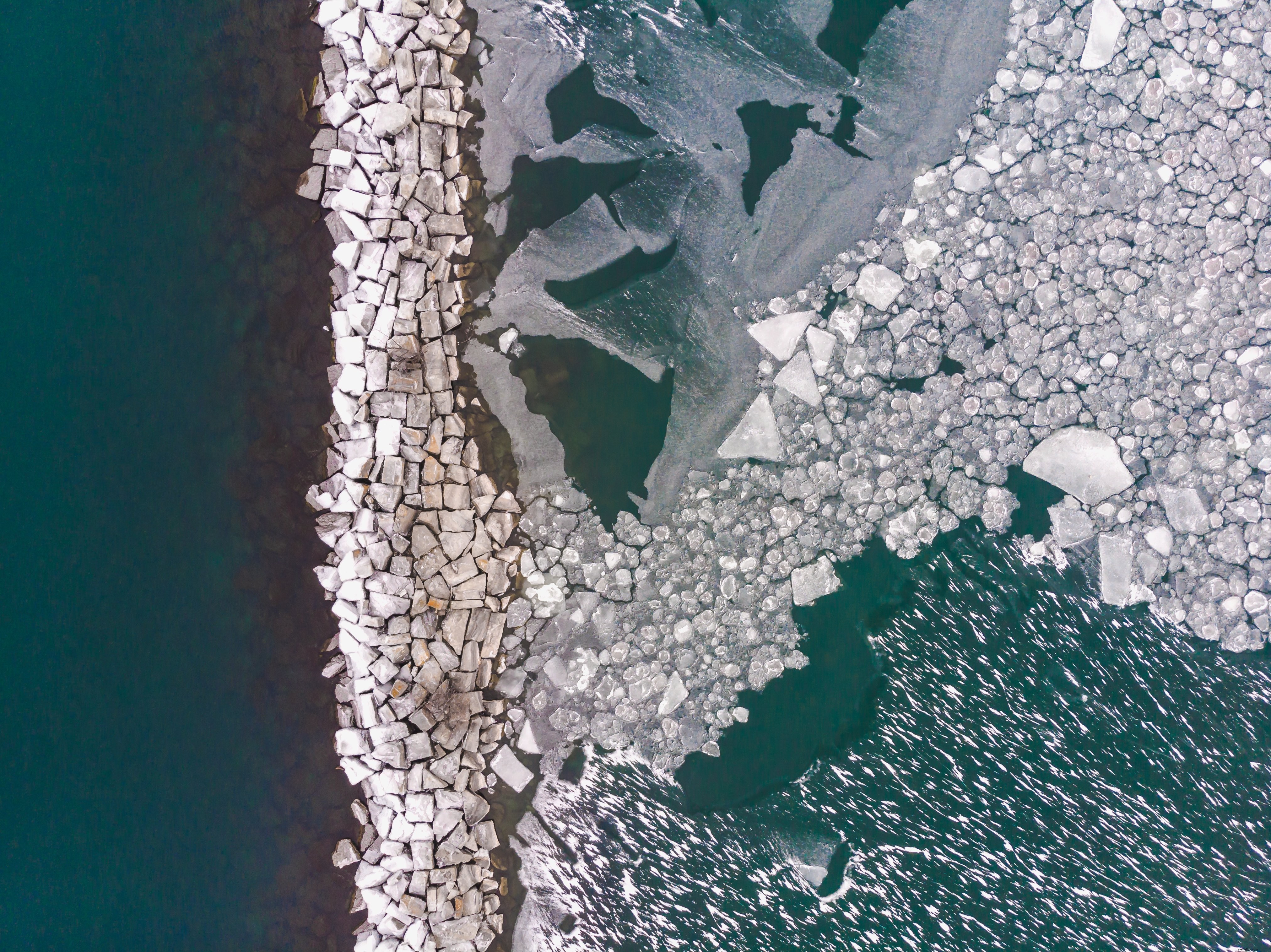Stunning Photo: Rocks Emerging from Icy Waters