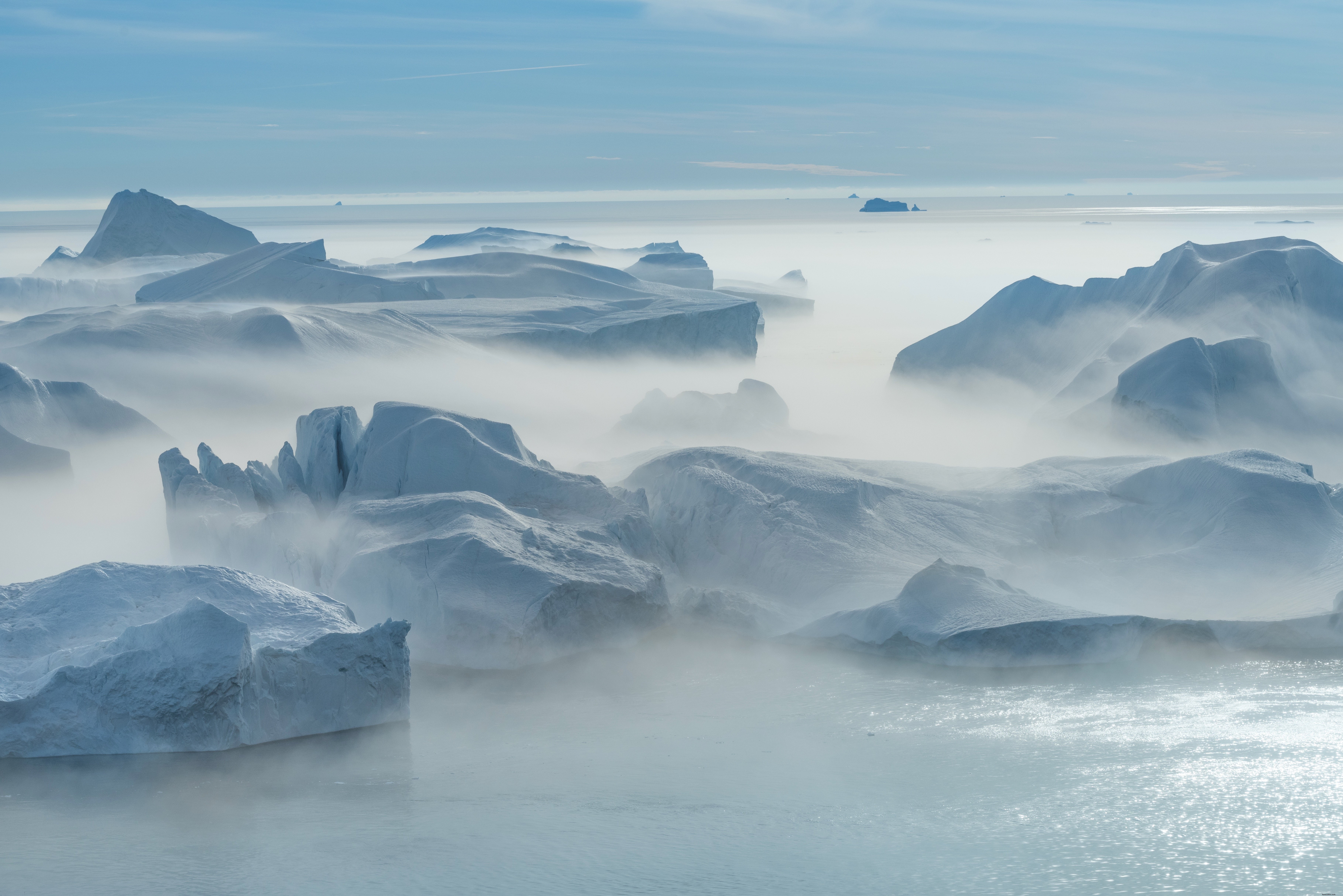 Ethereal Fog Rolling Over Icy Glaciers – Stunning Nature Photography