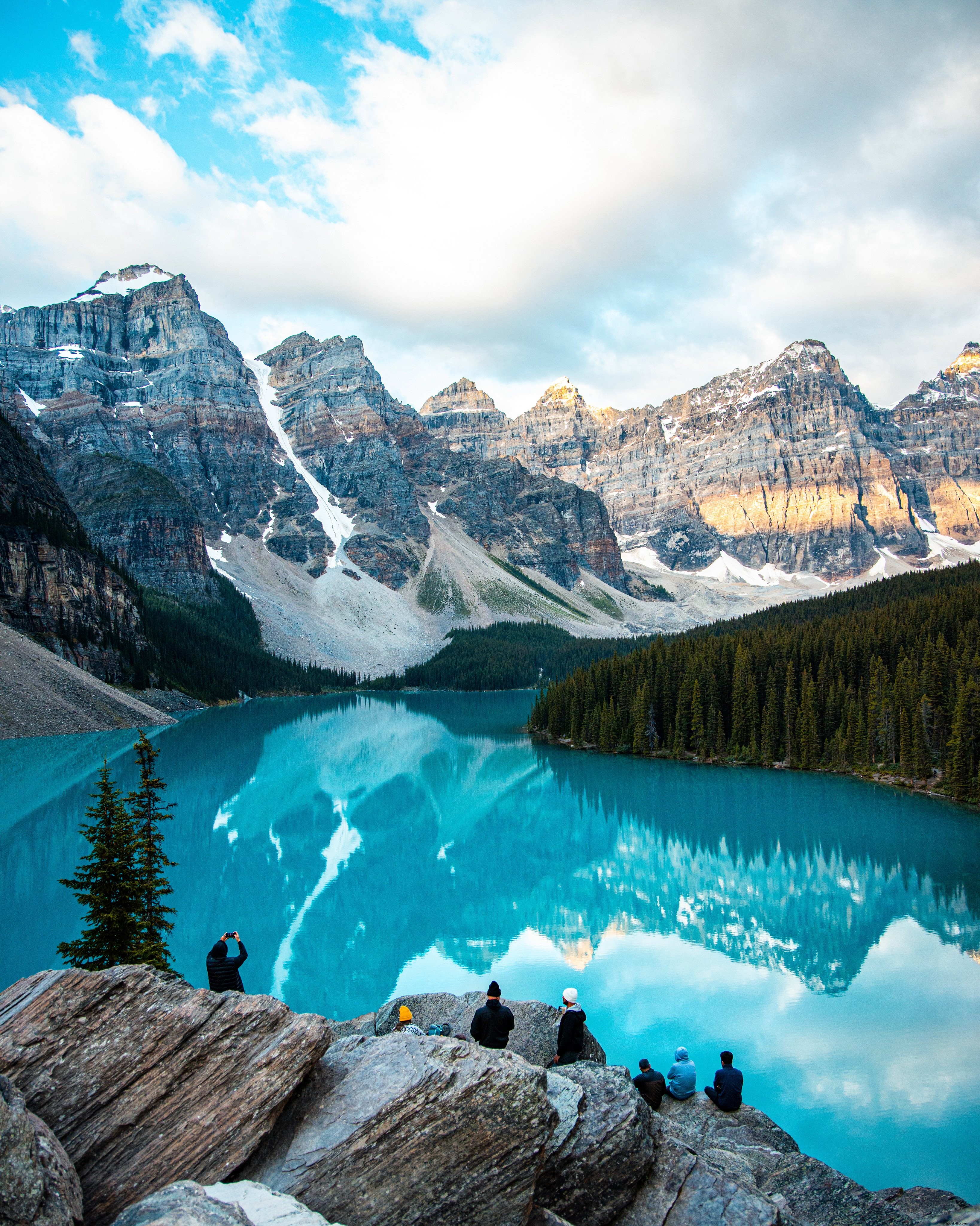 Stunning Snowy Mountains Reflected in Crystal Blue Pond