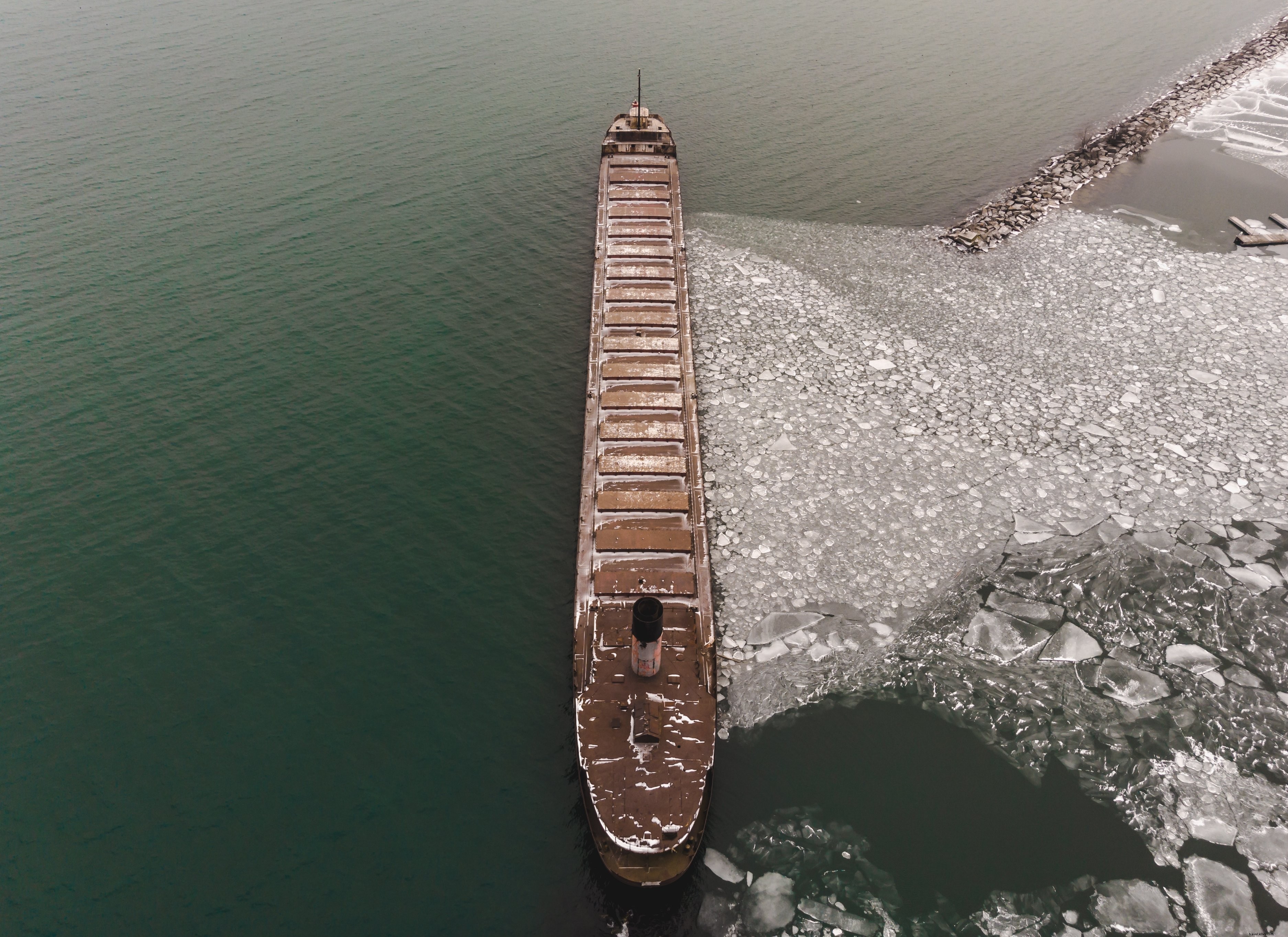 Stunning Photo: Ship Halts Drifting Ice Floe in Epic Stand