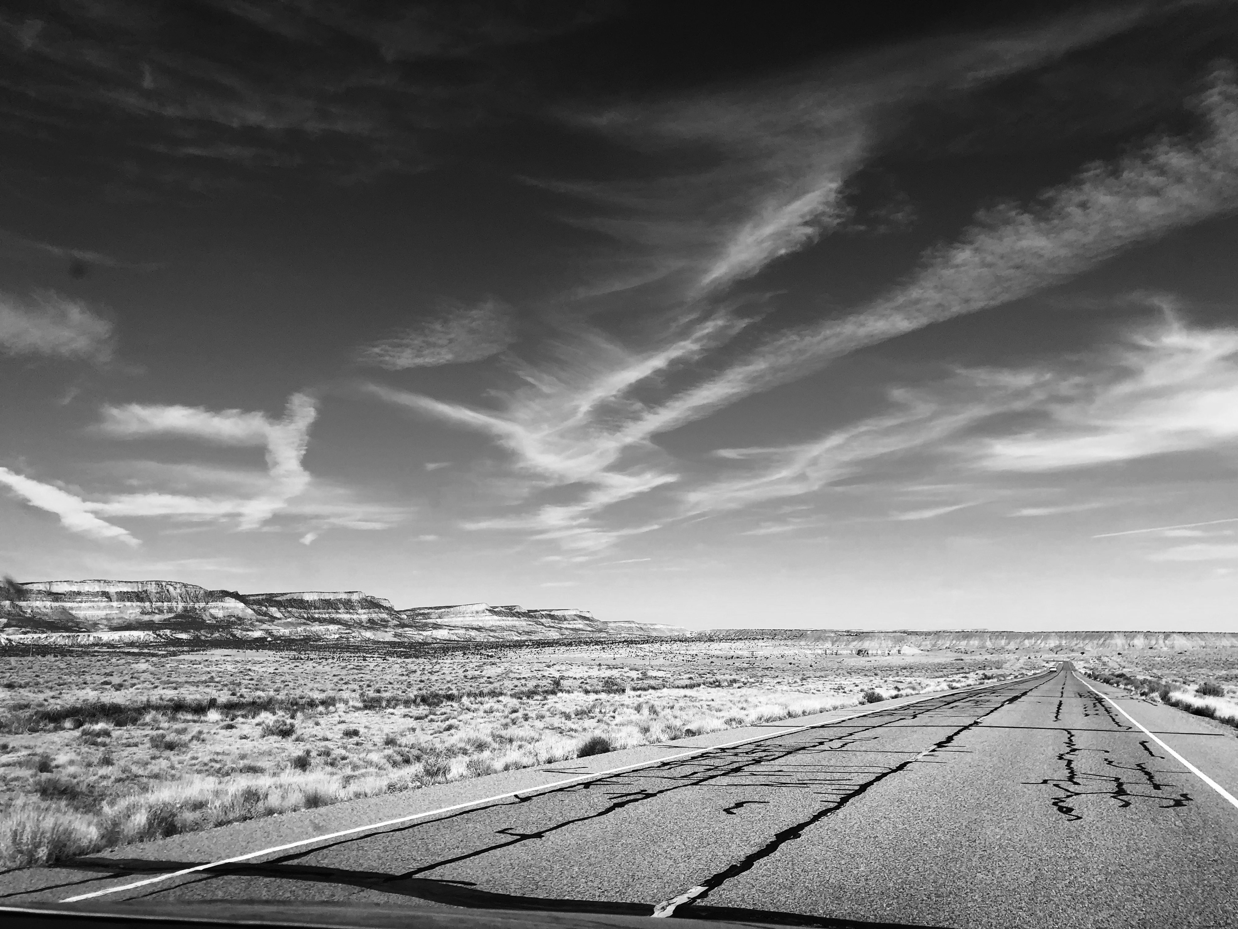 Stunning Sun-Cracked Desert Highway: Captivating Landscape Photo
