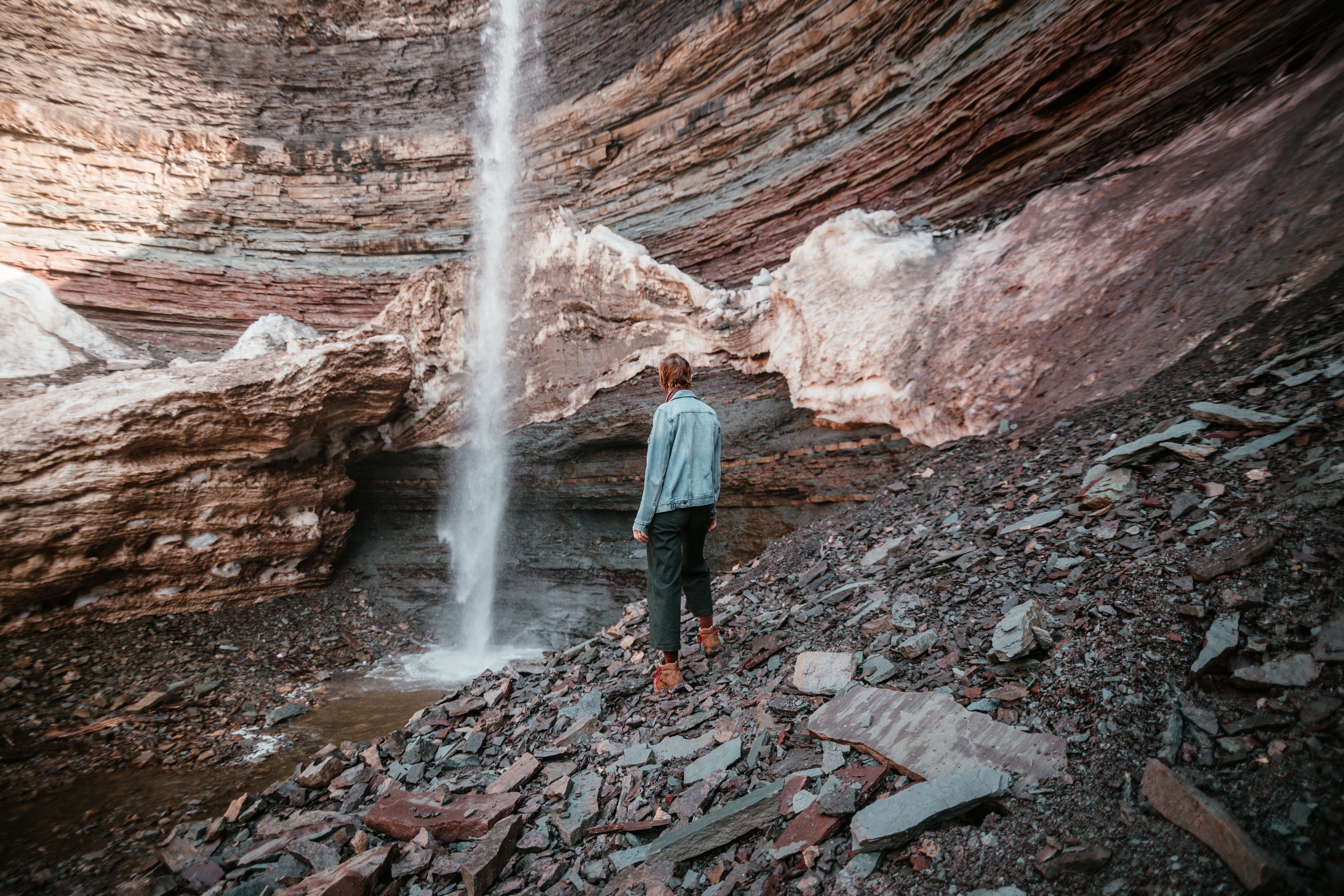 Stunning Photo: Powerful Waterfall Crashing at Rockface Base