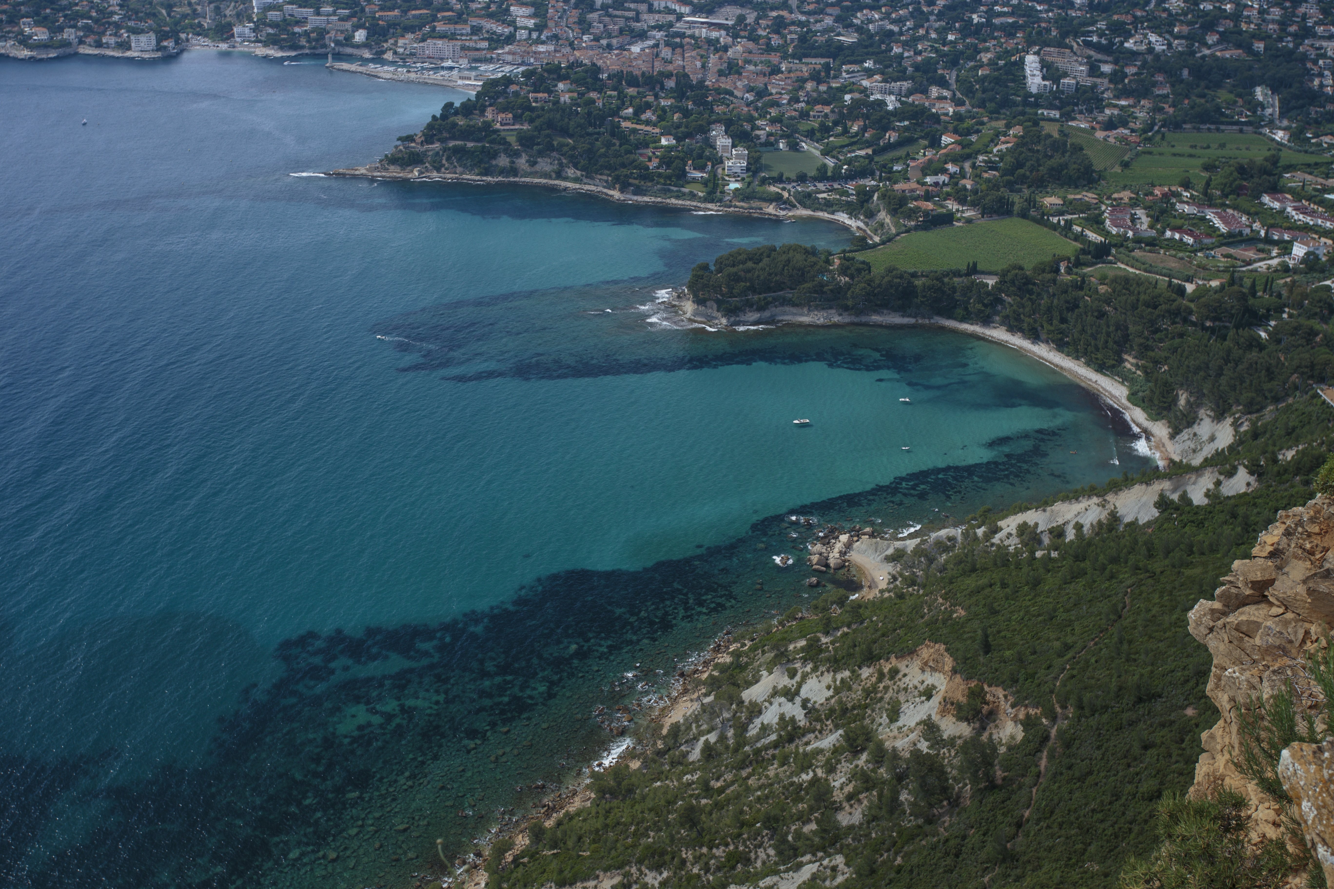 Stunning Aerial View of Crystal Clear Blue Waters Along the Shore
